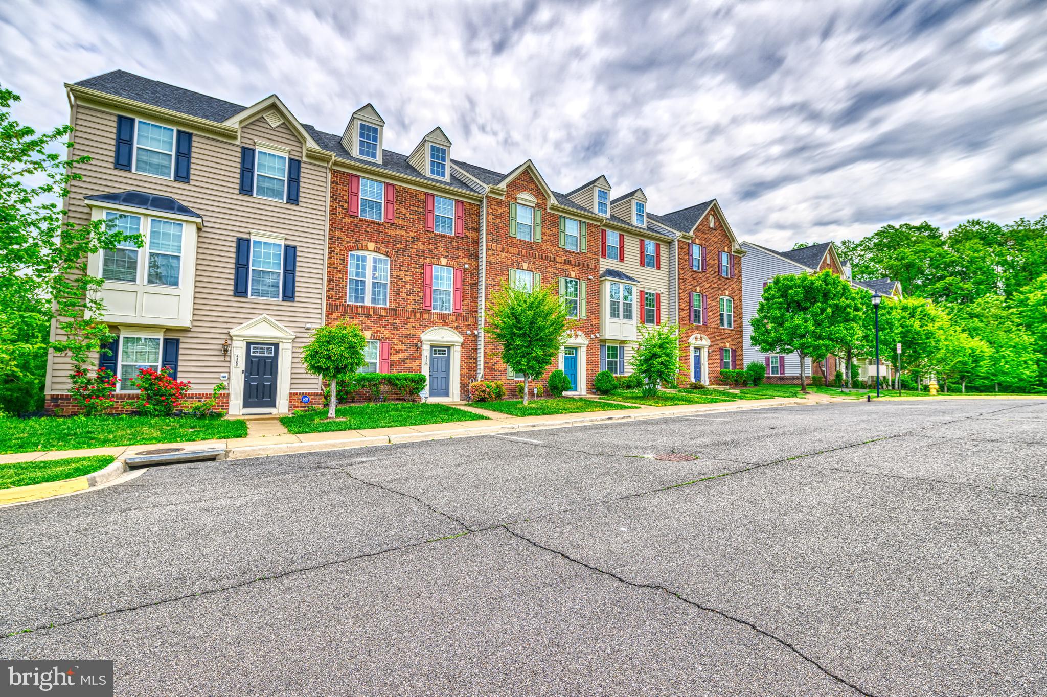 Charming 2-car garage townhouse in the desirable Reids Prospect community. This 2,100+ sq ft, 3-story home offers 3 bedrooms, 2 full, and 1 half baths. The main level boasts hardwood floors, a light-filled living and dining area, and a gourmet eat-in kitchen with granite countertops, a bar-top island and access to a deck off of the kitchen for summer BBQ. The spacious primary suite includes a walk-in closets and bath with a granite double vanity. Two additional bedrooms, a full bath, and laundry complete the upper level. The basement features a cozy recreation area and half bath. Enjoy a rear-loaded 2-car garage with a long driveway for up to 4 cars. Reids Prospect amenities include a clubhouse, outdoor pool, playgrounds. Conveniently located near shopping, I-95, commuter lots, and Quantico. Minimum 12 months. Schedule a showing today!