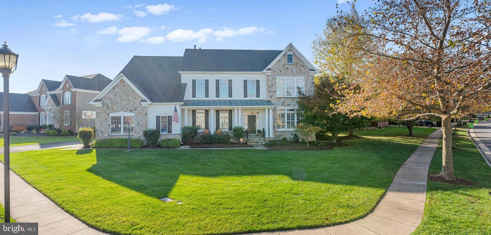 **Luxury Living in Lansdowne!** 

Welcome to this stunning and meticulously maintained 4-bedroom, 5 ½-bathroom home with a 3-car side-load garage, located in the resort community of Lansdowne on the Potomac. This property is situated in a prime area of executive homes with larger lots and wider streets and has over 5,000 square feet on the top two levels (7,000+ total including the finished basement).

**Key Features:**

- Professionally designed chef’s kitchen featuring a Subzero refrigerator, a 48-inch 6-burner dual-fuel Wolf stove, floor-to-ceiling custom cabinets, marble countertops, and a spacious kitchen island accommodating five.
- 10-foot ceilings on the top two levels.
- Hardwood floors throughout the main and upper levels, with luxury vinyl plank (LVP) flooring in the basement.
- Four bedrooms and four bathrooms upstairs, with each bedroom equipped with its own ensuite full bath.
- Upgraded handrails and a stair runner for added elegance.
- Multi-tier flagstone patio complete with a built-in grill and a flat, fenced backyard.
- Outdoor stone fireplace for cozy evenings.
- Designer light fixtures throughout, many by Visual Comfort.
- A dedicated office space on the main level, which can also serve as a main floor bedroom.
- The basement includes a non-conforming 5th bedroom (not to code) with an adjacent full bath.
- Approximately 2,000 square feet of finished space in the basement, featuring a recreation room, wet bar, office/5th bedroom (NTC), movie room, and a large unfinished storage area.
- New roof installed in 2017.
- New water heater added in 2022.
- Resurfaced driveway in 2024.

Lansdowne offers an array of amenities, including indoor and outdoor neighborhood pools, sports courts, playgrounds, a canoe launch, sidewalks, walking trails, and a fitness center. It is also adjacent to the world-class Lansdowne Resort, which provides golf and social memberships. 

Welcome to your new home!
