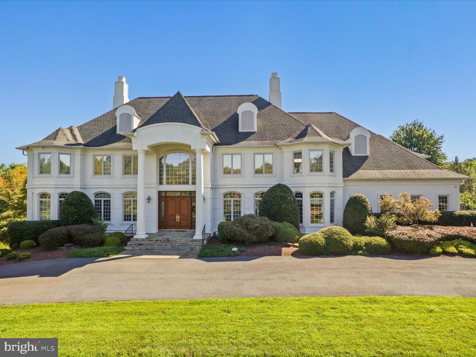 Entertain in luxury any time of year.  This home in the prestigious Palatine neighborhood, is ready for you and your next event.  The graceful hall foyer with its full height ceiling, marble floors and classic staircase, invites your guests to a dramatic formal dining room on one wing and an intimate sitting room on the other.  Lots of daytime sunlight brightens the entire home.   Tucked away is a sunroom to enjoy regardless of the weather.  A stately great room opens from the hallway towards the back equipped with  a wet bar, warm stone surround fireplace with plenty of seating areas.   A main-level bedroom suite and office are accessible down a back hallway on the floor.   The great room opens to a gourmet kitchen equipped with top of the line appliances, a multitude of storage with a catering area, and additional powder room behind.   Plenty of closet space and access to the side load four car garage complete the wing.  Access to the backyard patio from the kitchen/great room completes the flow from entrance to backyard.   A stunning outdoor space with an expansive decorative patio that has room for multiple seating/dining areas, an outdoor kitchen and trellises and beautiful landscaping that flowers throughout three seasons. Follow the patio steps to a lower level pool area for some water fun and exterior access to a bath and basement walk-out with interior gaming area space.  Upstairs, the oversized primary bedroom with its lighted tray ceiling and gas fireplace and seating area, is a space you will want to relax in.   The opulent spa-like bath includes an oversized shower, soaking tub, double sinks with ample cabinet space and separate water closet, leads to a large and well-designed closet.   Four other bedroom suites and a laundry room and back staircase round out this level.   The furthest of the secondary suites is oversized and can be used as an au pair suite with its an additional staircase to the garage and outside access.  The basement entertainment areas include a very modern bar area and theatre room with dramatic color changing lighting as well as an expansive room currently divided into a gaming area and conversation area, a flex room for gym space, a full bath with exterior access to the pool area.  The yard is fully fenced with ornate fencing and gate.  The home includes a solar panel system, generator, four HVAC systems, two water heaters and a central vac system.  This much loved and maintained home is ready for her next owners!
