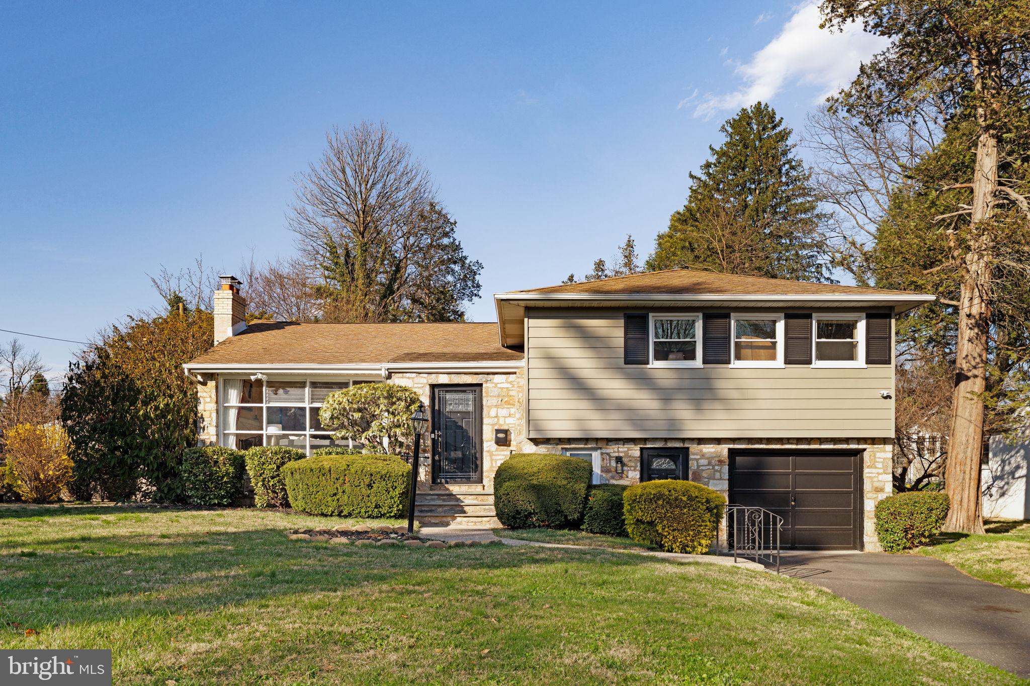 OFFER DEADLINE ALERT: All offers without escalation clauses are due by 5 PM EST on Monday, March 31. Totally updated Stone, Brick, Taupe Metal Siding & Matte Black exterior Mid-Century 3 bedroom, 2.5 bath, 1 car garage, 3 car driveway home w/ a wood burning fireplace, large basement w/ a walk-in Cedar closet & loads of storage, Flagstone patio off the family room, fieldstone landscaping walls, deck w/ railings & stairs to the backyard off the dining room, welcoming Bluestone front porch/steps, additional front entry w/ no steps into the laundry/mudroom w/ double utility sink, large family room w/ custom built-ins & half bath, entry foyer w/ a coat closet opens to the living room w/ White Brick fireplace, vaulted ceilings & recessed lighting, living room is wide open to the dining room & gourmet cook’s kitchen w/ breakfast bar on a partially fenced level, large open & sunny .34 acre lot w/ front, side & rear yards w/ plenty of room for a pool, hot tub, pickle ball court, organic flower/plant/herb gardens on very sought after Stratford Avenue in always desirable Elkins Park in A rated Cheltenham school district! Open & flowing floor plan w/ 3 giant bay windows in the living, dining & family rooms. Updates include: the entire interior & exterior were just professionally painted, professionally refinished Oak hardwood floors, open gourmet cook’s kitchen w/ breakfast bar (Solid Wood Cabinetry, Stone countertops, Glass tile backsplash, stainless steel GE Profile appliances: 5 burner gas range/convection oven, French Door refrigerator/freezer, microwave, dishwasher, ceramic tile floors, LED under cabinet & recessed lighting, disposal, under mount sink, faucet, cabinet pulls, crown molding), En-Suite Primary bedroom full bath (shower w/ Rain head, glass door, wall tile, sink, faucet, vanity, countertop, faucet, Brushed Brass lighting & mirror, luxury vinyl plank flooring, dual flush toilet), 2nd full bath (bathtub, wall tile, shower Rain head, sink, faucet, vanity, countertop, faucet, Brushed Brass lighting & mirror, luxury vinyl plank flooring, dual flush toilet, linen closet), half bath (light fixture, mirror, sink, vanity, faucet, dual flush toilet, wainscotting, chair rail molding, shelf, tile floor), roof (architectural shingle), gutters, downspouts, soffits, fascia, GE gas hot water heater, 1 year old Heil HVAC gas forced air heating & central air systems, Honeywell programmable thermostat, electric, GE Profile washer, LG dryer, Low-E Double Hung windows, interior 6 panel doors, ceiling fans, Tongue & Groove fence, Flagstone patio, asphalt driveway, pressure washed exterior, low maintenance landscaping, luxury vinyl plank flooring in the family room & laundry/mud room, Matte Black insulated storm & entry doors, Garage Door, window shutters & exterior light fixtures, Brushed Brass light fixtures, chimney caps, ceiling fans in bedrooms & more. Features: lots of windows, light & storage. Large Primary bedroom has a walk-in closet, built-in's, crown molding & recessed lighting. Large Basement w/ built-in's perfect for kids or pets playroom, Peloton/Yoga/Fitness, arts & crafts, home office/business & additional storage. Large family room has crown molding & recessed lighting. The yard, deck, patio are perfect for kids, pets, entertaining, relaxing, your next BBQ, birthday or special occasion. Front, rear & side yards get all day sun, lots of room to play fetch, catch & sports. Amazing location: walk to the Melrose & Elkins Park SEPTA regional train stations to Downtown Philly, 30th St. Station, Philly Airport & elsewhere. Walk to the Village of of Elkins Park’s schools, shops, restaurants, bakeries, breweries, coffee shops, pet stores, dog parks, parks, playgrounds, arboretums, trails & libraries. Easy access to Whole Foods, Trader Joes, Target, Routes 1, 13, 309, 611, 73, 76, 476, 95, 295, Hospitals, Universities, Center City, PA suburbs, NJ & DE Beaches, Poconos, DE, NJ, NYC & Brooklyn.