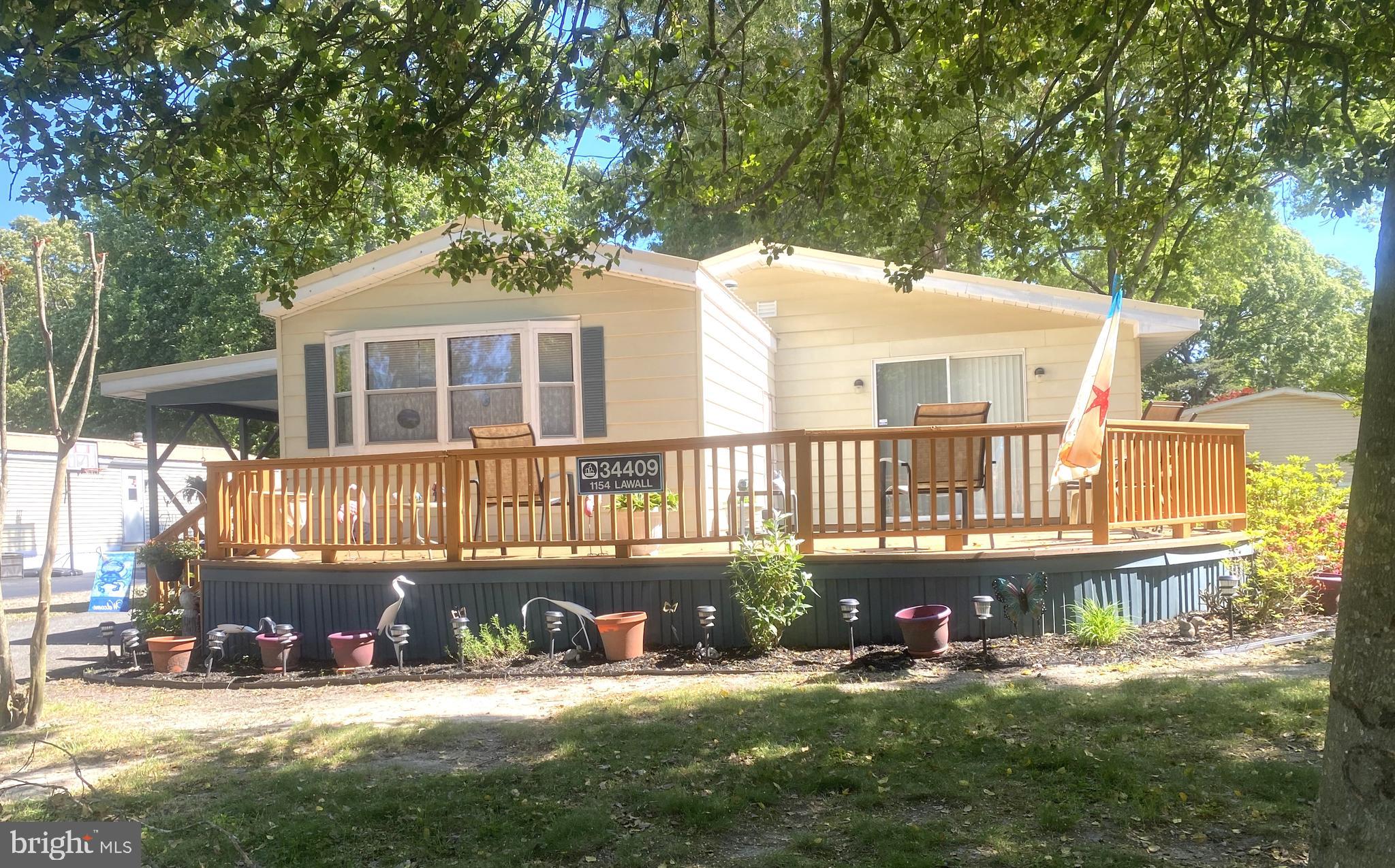 Step into a world of comfort and convenience with this charming 1680 sq. ft. residence, perfectly designed for family living. Heating and air conditioning systems and water heater and a new metal roof have all been replaced within the past 7 years.  Plumbing has been updated and/or replaced with throughout the home.  Featuring 2 spacious bedrooms and 2 baths, this home offers ample space for everyone to unwind and thrive. Experience the warmth of two inviting living areas that provide the perfect backdrop for larger gatherings, movie nights, or simply relaxing after a long day. The eat-in kitchen is equipped with newer stainless steel appliances that make food prep a breeze. Its seamless connection to the family room ensures that you can entertain your guests while preparing the meals.

Retreat to the primary suite, where comfort meets luxury. Indulge in the newly installed walk-in shower that transforms your daily routine into a relaxing experience. This private sanctuary is your personal escape, ensuring restful nights and rejuvenating mornings.

Step outside to discover a beautiful, newly updated composite deck, that’s ideal for family gatherings, game nights, or soaking up the sun with a good book. Whether you’re hosting a summer barbecue or enjoying a quiet evening under the stars, this outdoor space is designed for both leisure and enjoyment.

This home is not just about aesthetics; it’s designed for practicality too. With a large carport and an attached shed, you’ll have plenty of space for all your beach toys and golf car, making it easy to embrace the coastal lifestyle. The front deck invites you to relax with your morning coffee, while the back deck is perfect for grilling up delicious meals.

Nestled in the tranquil community of Creekside, you’ll be surrounded by nature’s beauty. Enjoy access to scenic walking trails, a community dock for fishing or kayaking, and a variety of recreational amenities just minutes away. This is more than just a home; it’s a lifestyle that promotes relaxation and connection with nature. This perfect blend of comfort and coastal living is waiting for you. Make your dream home a reality in Creekside—where every day feels like a vacation. Schedule your visit today and take the first step towards your new life!

**** Lot Rent Paid Though December 2026 and is Included in the Sale****