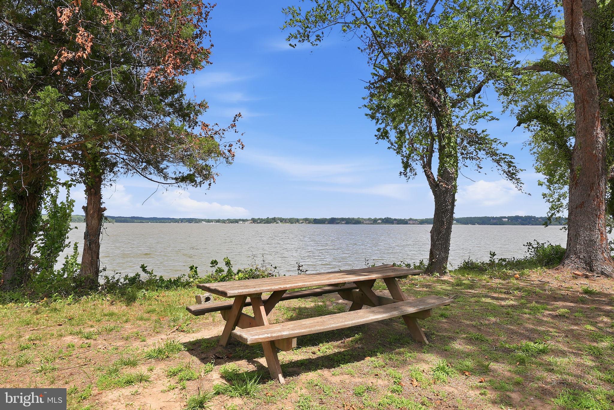 Opportunities like this don’t just happen—they are discovered. 1100 Cataway Place is a truly special diamond in the rough, a sprawling 13-acre waterfront sanctuary defined by multi-million dollar views that are nothing short of legendary. Situated directly across the Potomac from George Washington’s Mount Vernon, this estate offers a vantage point where history and nature collide in a spectacular, panoramic display.

The water is the focal point of the entire experience here. Whether you are wandering the expansive grounds, relaxing in the main residence, or standing on the guest house deck, the shimmering Potomac and the iconic silhouette of Mount Vernon are your constant companions.

The property features two beautifully renovated residences that lean into this incredible backdrop. The primary home exudes sophisticated warmth, with four spacious bedrooms and three full baths. Throughout the sun-drenched interiors, rich hardwoods lead the eye toward nearly every window, each perfectly framing a different, breathtaking perspective of the river.

Just a few steps away, the guest house is a gem in its own right. Fully updated with three bedrooms and two full baths, its standout feature is a private Trex deck designed specifically for soaking in those wide-angle water views as the sun dips below the horizon.

The land itself is a private world of lush woods, a tranquil pond, and expansive open fields that all seem to point back toward the river's edge. It’s a place that feels worlds away from the hustle, yet the energy of Washington, D.C. is reachable in   40 minutes. Whether you envision a private legacy estate, a high-end retreat, or a creative venue, this is a one-of-a-kind chance to own a piece of history with a view that is truly priceless.