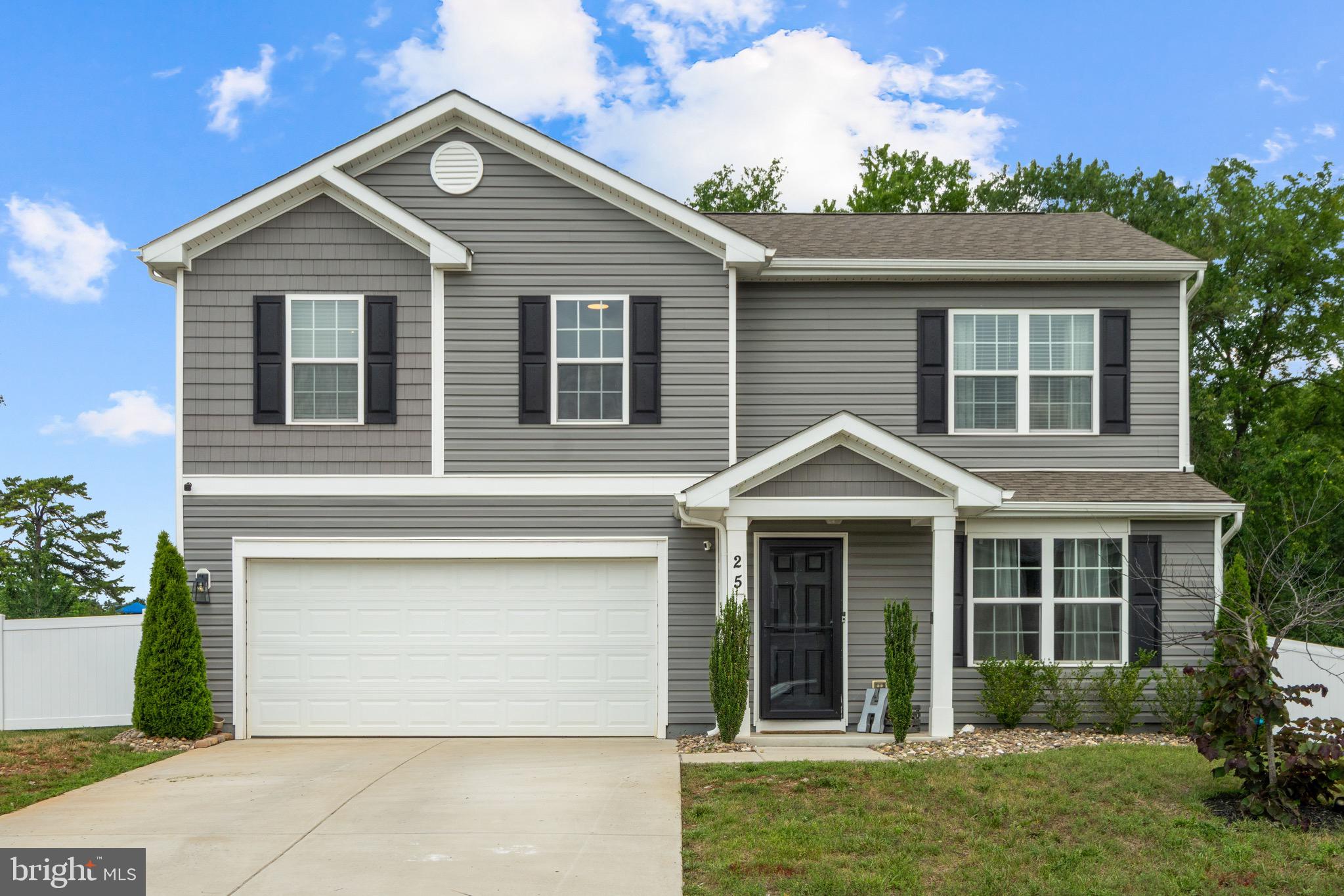 Welcome home to 25 Wilson Drive in Berryville, a four-year old home with stunning and tasteful upgrades and accents in every room of the house. The owners have lovingly cared for, maintained and added to the house to make it a truly unique home. Enter into a large, light-filled living area with its own accented entertainment area. The living area looks into a modern kitchen with granite counters, modern stainless steel appliances, a custom island for extra seating. Down the hall is a tastefully appointed powder room and beautifully decorated and accented mud room with lots of storage for coats, boots and outside items, with plenteous seating to accommodate the transition. The owners have added unique and classy accents to the stair well and on the upper level, you'll find a modern laundry room with an upgraded and attractive barn-door style doorway. The primary bedroom is light-filled and roomy with another barn-door style entry to the walk-in closet. The primary bath is stunning and bright with quartz counter tops. Down the hall are three generous bedrooms, each with the touches of matchless design and accents. Upgraded and beautiful LVP flooring supports the entire house.  Outside you'll find a ground-level deck for entertaining, outdoor living and play and a garden shed that conveys. All this is backed up to trees behind it. The garage is roomy for two cars or keep it as an additional bar and workshop designed and built by the owners. This is a very unique house with tens of thousands of dollars of upgraded design, ready for it next owner in the charming town of Berryville, Virginia. Please confirm school boundaries with Clarke County Public Schools. Seller needs 45 day home of choice contingency.