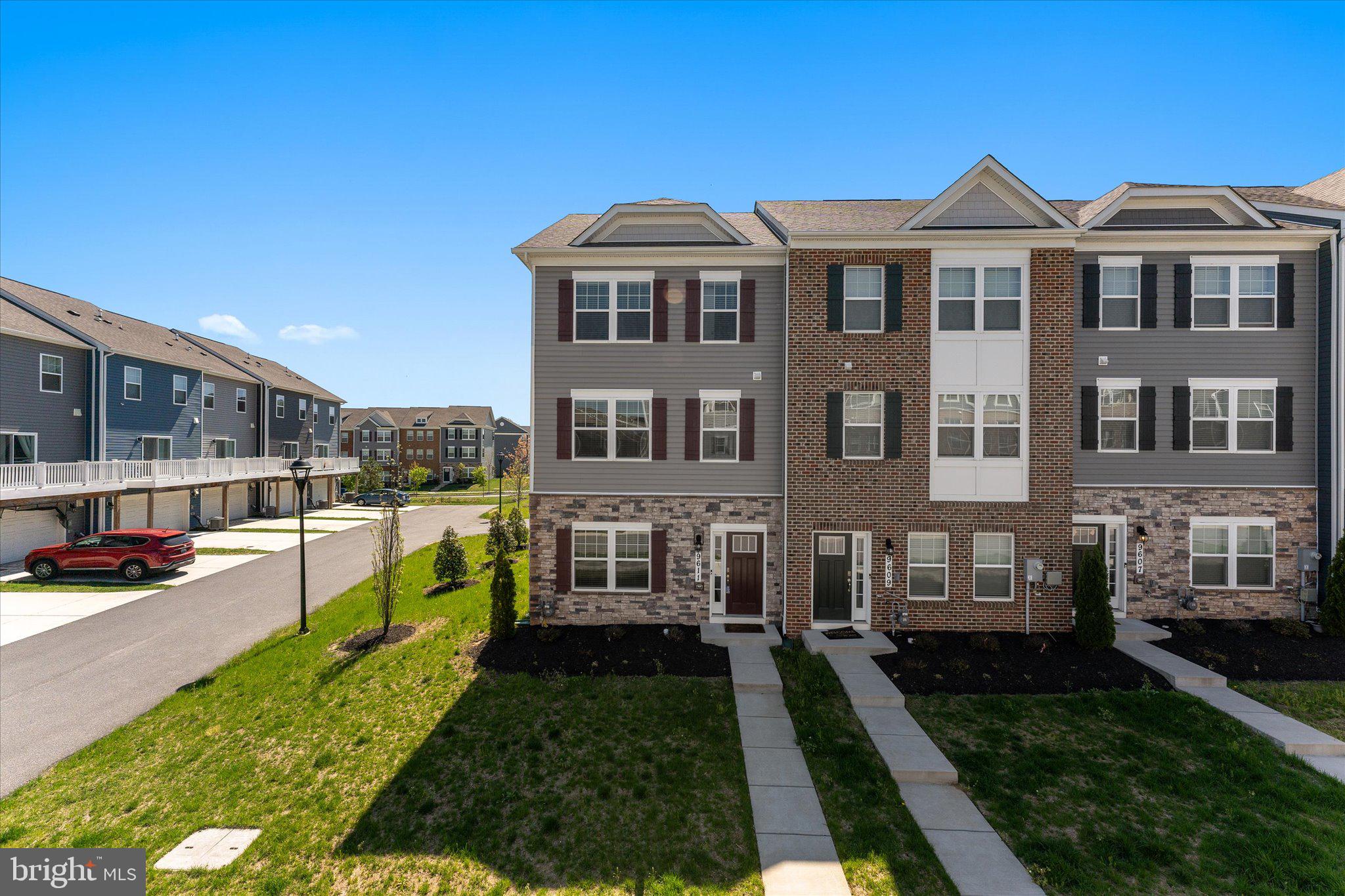 Welcome to 9611 Silver Bluff Way! Where Modern Living Meets Smart Efficiency

Located in the highly sought-after Woodmore Overlook community, this stunning 3-bedroom, 2.5-bathroom townhome offers 1,440 square feet of beautifully designed living space with all the upgrades today's homeowners desire. Built in 2021, this smart home is packed with modern features—including solar panels that help reduce energy costs and a smart home system for seamless control  security, and climate.

Key Features:

Smart Home Technology: Control your lighting, thermostat, security, and more—right from your phone.

Solar Panels: Energy-efficient living that lowers utility costs and reduces your environmental footprint.

Stylish Kitchen: Featuring quartz countertops, stainless steel appliances, and plenty of cabinet space—perfect for everyday cooking and hosting.

Open Floor Plan: Enjoy effortless flow throughout the main level with gleaming hardwood floors and natural light.

Luxurious Primary Suite: Includes a spacious bedroom, walk-in closet, and spa-like en-suite bath with dual vanities and a glass-enclosed shower.

Finished Lower Level: Ideal as a rec room, home gym, or dedicated office space.

Private Outdoor Deck: A perfect retreat for morning coffee or evening entertaining.

Two-Car Garage: Offers convenience, extra storage, and protected parking.

Community & Location Highlights:

Minutes to Woodmore Towne Centre—featuring top-tier shopping, dining, and entertainment.

Quick access to major commuter routes including I-495 and Route 50, offering an easy commute to Washington, D.C. and surrounding areas.

This home is the perfect blend of innovation, style, and convenience—don’t miss the opportunity to make 9611 Silver Bluff Way your new address. Schedule your private showing today!