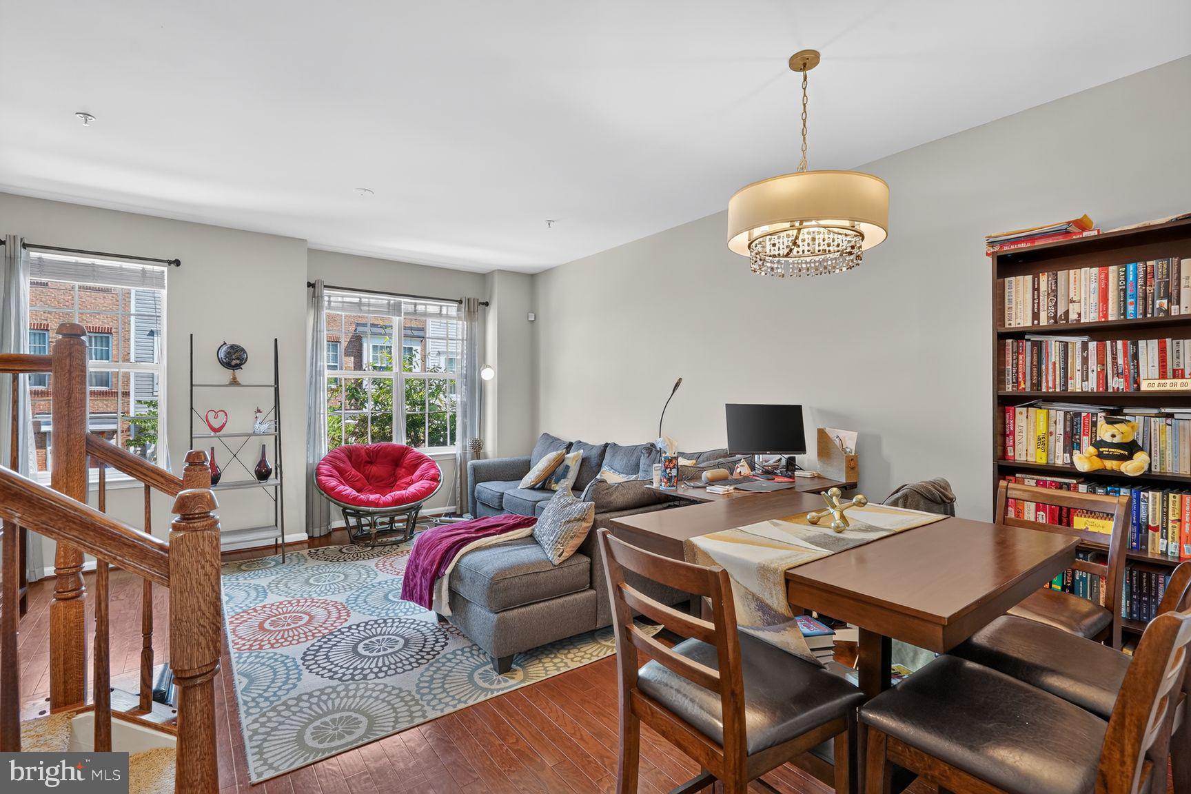 Welcome to 7243 Silver Thorn Way! <br>

This home has more upgrades than most in this model. Open House Saturday 2-4pm.
<br>

Experience modern comfort and unparalleled convenience in this stunning home, perfectly positioned for the commuter. Located within walking distance to the MARC train and just a short drive to the Greenbelt Metro, ICC, and I-495, this property puts the best of the region within easy reach. Upgrades include Kitchen appliances (GE Select Refrigerator, Gas Range, Microwave, Dishwasher), Superior upgraded carpeting vs. builder grade, Finished Garage with shelving storage.<br>

Key Features & Highlights:
Thoughtful Layout: This home features 3 spacious bedroom suites, each with its own full bath—including a luxurious primary suite complete with a large shower and double-sink vanity.
Gourmet Kitchen: The heart of the home boasts granite countertops, custom 42-inch cabinetry, beautiful tile backsplash, and seamless access to a private balcony, perfect for morning coffee or relaxing evenings. Per Tax Records, 1,920 total sf, plus 352 sf in attached garage. There is room for storage within the garage. <br>

Upscale Interiors: Enjoy an open, airy atmosphere with 9-foot ceilings, complemented by rich hardwood flooring and custom lighting throughout. <br>

Added Conveniences: Designed for ease of living, this home includes an upper-level washer/dryer stack and a private garage. <br>

Community Lifestyle: Take advantage of fantastic community amenities, including a refreshing pool and a fitness clubhouse. <br>

Whether you are looking for a commuter’s dream or a stylish retreat with resort-style perks, this home delivers on every level. Schedule your private tour today! <br>

Seller offering Buyer a 12 month home-warranty through Super Home Warranty. <br>

All square footage is approximate and is not to be used for valuation and any buyer should measure themselves for accuracy. All information deemed reliable, but not guaranteed.