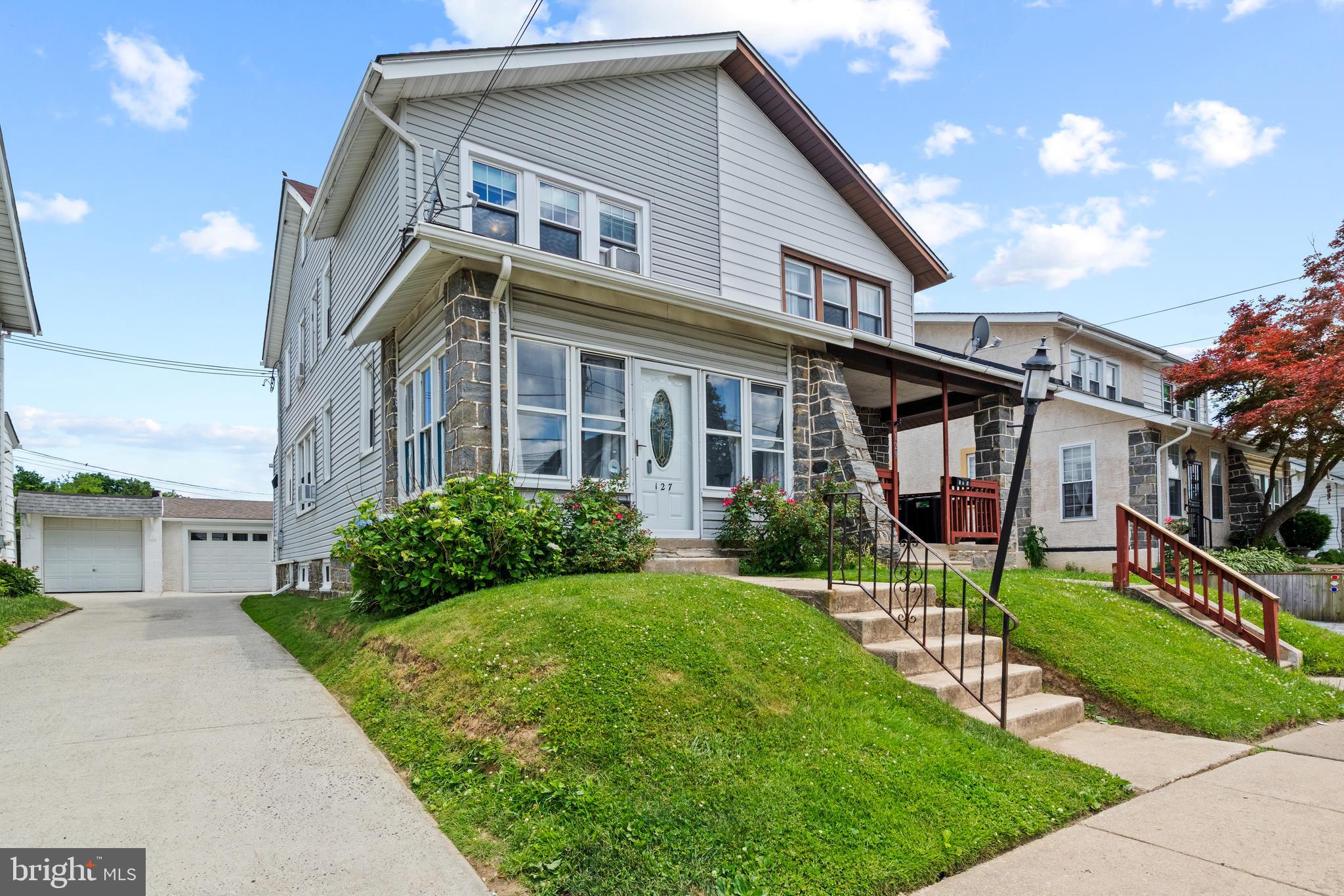 Welcome to 127 S Eagle Road, a beautifully updated and meticulously maintained twin home in the heart of Havertown. Offering 3 bedrooms, 1 full bathroom, a detached garage, low taxes, and no association fees, this move-in-ready home combines classic charm with modern upgrades and exceptional value.

From the moment you arrive, you'll appreciate the attractive stone-accented front exterior complemented by updated vinyl siding and inviting curb appeal. Enter through the bright and welcoming Florida room/enclosed front porch, the perfect space to relax with your morning coffee or unwind after a long day.

Inside, gleaming solid hardwood flooring flows throughout much of the main level, creating a warm and timeless feel. The spacious living room opens to a large dining room, providing an ideal layout for both everyday living and entertaining. The completely remodeled kitchen is sure to impress, featuring high-end cabinetry, granite countertops, an oversized sink, stainless steel appliances, gas cooking, a stylish tile backsplash, recessed LED lighting, and multiple breakfast bars and serving nooks that maximize both functionality and workspace.

Upstairs, the primary bedroom is filled with natural light from multiple windows and offers plush carpeting and a ceiling fan for year-round comfort. The second and third bedrooms both feature hardwood flooring and ceiling fans, providing comfortable and versatile living spaces.

The fully remodeled bathroom showcases quality craftsmanship and upscale finishes, including radiant electric heated flooring, a stunning walk-in subway tile shower, premium fixtures, and frameless mitered glass shower doors that create a luxurious spa-like experience.

The unfinished basement provides ample storage space. Outside, enjoy a private, fenced backyard complete with a covered deck—perfect for outdoor dining, entertaining, gardening, or simply relaxing.

Conveniently located near parks, shopping, restaurants, public transportation, and major commuter routes, this turnkey Havertown home offers the perfect combination of location, character, and modern updates.

Don't miss this incredible opportunity. Schedule your private showing today—homes this updated and move-in ready do not last long!