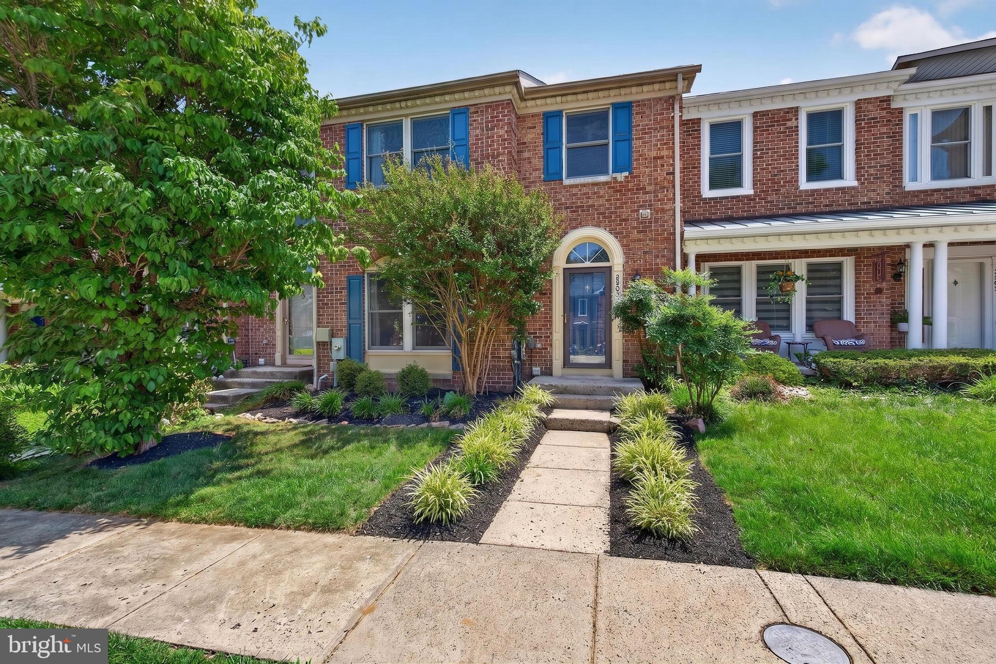 Welcome home to a beautiful blend of suburban convenience and natural surroundings. Located just minutes from the scenic paths at Quarry Lake, this beautifully renovated brick-front townhome is surrounded by lovely woodland and offers easy access to waterfront dining, gourmet grocers, and nearby outdoor recreation.
Updated with timeless finishes, this home offers a superior layout with everyday usability in mind. A tiled foyer and eye-catching powder room greet you before you step onto pristine hardwood floors that run throughout the main and upper levels. The expansive, well-preserved eat-in kitchen features granite countertops, an island with bar seating, a breakfast nook, and a new dishwasher. The picturesque bay window frames seasonal foliage views, creating a beautiful backdrop for morning coffee. A pass-through cutout keeps the kitchen connected to the dining and living rooms, while French-style doors open to the deck, making indoor-outdoor entertaining a breeze.
The primary suite boasts vaulted ceilings, another sunlit bay window, and a roomy walk-in closet. The spa-like en-suite bath features a natural stone shower, freestanding soaking tub, and double-sink vanity for added everyday convenience. Thoughtful touches like a wall-controlled bidet and towel warmer add comfort. Both upper full baths offer a wealth of custom drawer storage, and a laundry chute drops linens straight to the basement laundry room.
High ceilings keep the finished walkout basement open and bright. The family room centers on a cozy fireplace, while a private lower-level office and full third bath create a quiet setup for work, hobbies, or guests. An efficient, dedicated laundry room and a utility space with extensive built-in shelving completes the lower level. French-style doors lead outside to a stone patio and grassy yard with room for a garden. Rest easy with a brand-new architectural shingle roof with 50-year warranty, an oversized 80-gallon hot water tank, and parking right at your front door.