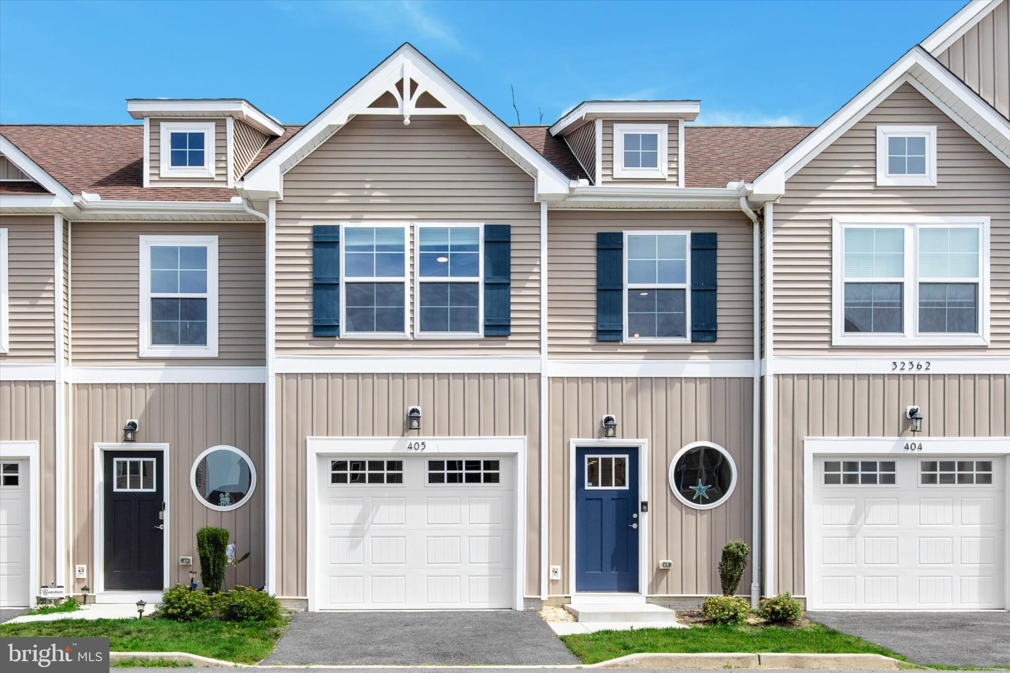 Welcome to effortless coastal living in this beautifully maintained, like-new contemporary townhome, offering three bedrooms, two-and-a-half baths, and a one-car garage in the desirable Cea Dag community. Built in 2023 and presented in pristine condition, this home feels fresh, bright, and truly move-in ready. One of its most appealing features is the peaceful setting. Unlike many townhomes, this property backs to open farmland and mature trees, providing scenic views and a wonderful sense of privacy with no homes or buildings directly behind you. Whether enjoying your morning coffee or unwinding after a day at the beach, you'll appreciate the tranquil backdrop of open green space. Step inside to a dramatic two-story foyer highlighted by an eye-catching round atrium window and additional upper-level windows that fill the entry with natural light. Luxury vinyl plank flooring flows throughout the main living areas, creating a stylish and durable foundation for everyday living.

The open-concept floor plan is designed for both comfort and entertaining. Coastal-inspired finishes and thoughtful design touches can be found throughout, including textured lighting, modern ceiling fans, elegant glass pendant lights above the kitchen island, and sophisticated black hardware accents. The kitchen is as functional as it is attractive, featuring quartz countertops, stainless steel appliances, recessed lighting, and a refrigerator with an ice and water dispenser.

The living and dining areas flow seamlessly together, creating an inviting space for gathering with family and friends. Sliding glass doors lead to the rear patio, where you'll enjoy peaceful views of lush greenery, open fields, and mature trees. Privacy fencing between units enhances the outdoor space, making it the perfect place to relax, dine outdoors, or simply enjoy the quiet surroundings. The main level also includes a convenient powder room and interior access to the attached one-car garage. Upstairs, the spacious primary suite serves as a private retreat, complete with a walk-in closet and an en suite bath. Two additional bedrooms offer comfortable accommodations for family, guests, or a home office, and both enjoy beautiful views of the open space behind the home. A full hall bath completes the second level.

Whether you're searching for a full-time residence, a low-maintenance second home, or the perfect coastal getaway, this home offers the ideal combination of modern style, comfort, and location. Residents also enjoy access to the community swimming pool, adding another layer of enjoyment to this exceptional coastal lifestyle opportunity.

Conveniently located near Route 113, Cea Dag provides easy access to everyday conveniences while maintaining a charming small-town atmosphere. Historic downtown Dagsboro is just minutes away, offering local shops, cafés, restaurants, and community events. Bethany Beach is approximately 12 miles away, making beach days, waterfront dining, and coastal adventures easily within reach.