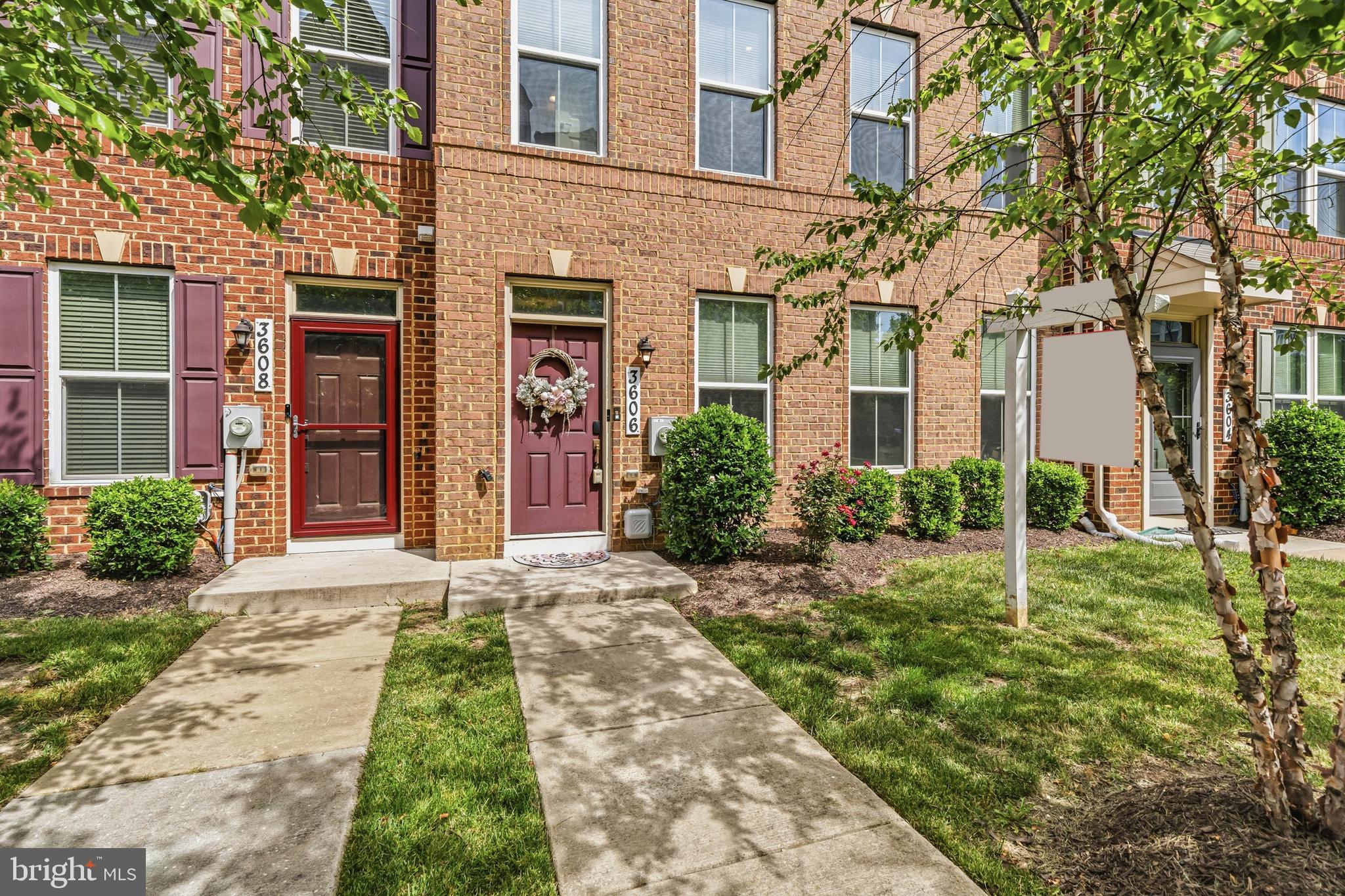 Experience easy, modern living in this attractive brick-front townhome featuring a two-car garage, spacious light-filled interior, and desirable community amenities. Large windows throughout the home fill the living spaces with natural light, creating a bright and welcoming atmosphere.

The heart of the home is the gourmet kitchen, thoughtfully designed with stainless steel appliances, granite countertops, an oversized island, and convenient bar seating—perfect for meal preparation, casual dining, and entertaining guests. The open-concept layout provides seamless flow between the kitchen, dining, and living areas.

Upstairs, comfortable bedroom spaces are complemented by the convenience of an upper-level laundry area, making everyday routines effortless.

Enjoy a low-maintenance lifestyle with HOA services that include lawn care, exterior building maintenance, trash and snow removal. Community amenities feature a swimming pool, tennis courts, playgrounds, and a dog park, offering plenty of opportunities for recreation, relaxation, and outdoor enjoyment.

Ideally located near shopping, dining, movie theaters, and major commuter routes, this home places everyday convenience right at your fingertips. Nearby retail and essentials include Costco Wholesale, BJ's Wholesale Club, Target, and Aldi, along with quick access to shopping and dining at St. Charles Towne Center.

This exceptional townhome offers the perfect blend of style, comfort, convenience, and maintenance-free living.