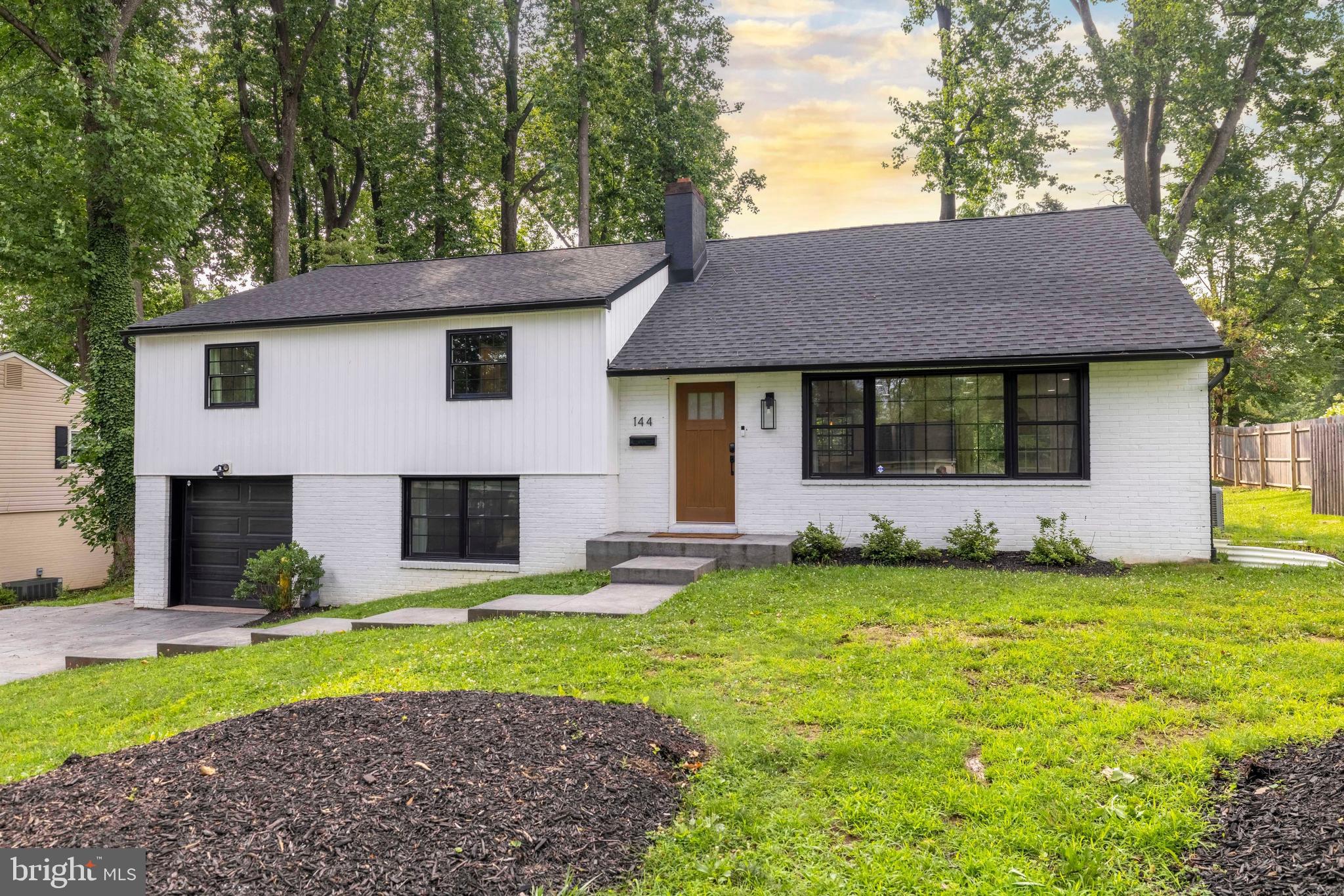 Welcome to this beautifully remodeled brick home in a desirable Upper Moreland neighborhood. With a perfect blend of style, comfort, and functionality, this 4-bedroom, 2.5-bath home offers everything today’s buyers are looking for. The bright, open concept  living room boasts beautiful new floors, built-in cabinets and electric fireplace. The dining area with sliders to the back deck has been incorporated into the living space and flows into a remodeled kitchen, complete with quartz counters, farmhouse sink, pendant and recessed lighting, gas cooking and large center island with seating, ideal for entertaining, or gathering with friends and family. Just a few steps down is a spacious family room with a woodburning fireplace. An updated powder room, mudroom with access to the attached garage and backyard, along with a convenient laundry area/utility room complete the lower level. Upstairs, the spacious primary suite offers an updated bathroom with walk-in closet, double sinks and walk-in shower. Two more generously sized bedrooms and a renovated full hall bath are also located on the second floor. A bright spacious fourth bedroom/bonus room with newer mini-split is on the third level. The incredible outdoor living space features a large deck with tv hookup, play area and plenty of open space for gardening or entertaining. Walk to brand new Woodlawn Park which will feature walking trails, playground, picnic pavilions, baseball field and multi-use courts. Additional highlights include new plumbing throughout the home, new 200 amp underground electrical service, newer HVAC, hot water heater, windows, doors, siding, and roof. Ideally located just minutes from Pennypack Nature Preserve, June Fete Grounds, and Masons Mill Park, this home is part of the award-winning Upper Moreland School District and offers easy access to shopping, trains, and major routes. This charming, move-in-ready home is a rare opportunity and won’t last long.
