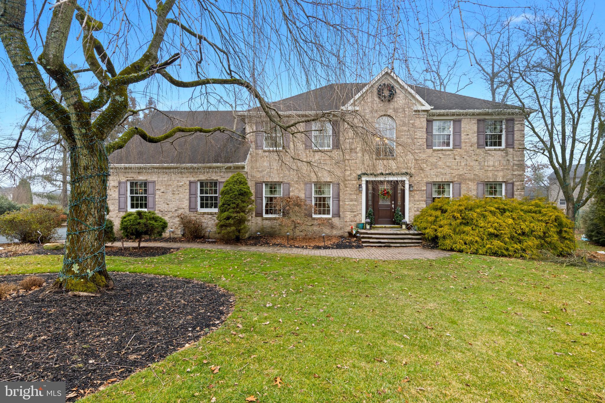 Situated at the end of a quiet five-home cul-de-sac in sought-after North Wilmington, this elegant Capano-built colonial totaling 5,355 Sqft of livable area is offered. The immaculate design boasts timeless architecture, thoughtful updates, and exceptional warm living space.A dramatic two-story foyer welcomes you into the home, flanked by a formal living room with crown molding and a gracious dining room featuring crown molding and chair rail detailing—perfect for both everyday living and entertaining.The beautifully updated eat-in kitchen (2019) serves as the heart of the home, showcasing Italian tile flooring, granite countertops, a striking granite waterfall island, tile backsplash, recessed lighting, pantry storage, and stainless-steel appliances. Adjacent to the kitchen is the convenient main-level laundry room with access to the rear deck and attached garage.Just beyond, the inviting family room features soaring cathedral ceilings, skylights, new carpeting, and a dramatic floor-to-ceiling brick fireplace, creating a warm and comfortable gathering space. A private office and powder room complete the main level.Upstairs, the spacious primary suite offers a relaxing retreat with a private bath featuring a Jacuzzi tub, separate shower, double vanity, and tile flooring. Connected to the suite is an impressive exercise room with hardwood floors, mirrors, and skylights—easily adaptable as a sitting room, studio, or additional flex space. Three generously sized bedrooms and a hall bath complete the upper level.The finished basement provides outstanding additional living space designed for entertaining, highlighted by a wet bar, expansive recreation area, beautiful wainscoting, and a powder room with marble flooring. An additional tiled room offers versatility for hobbies, fitness, or storage. Completed around 2015, the lower level also includes a separate HVAC system for added comfort.This exceptional home blends the craftsmanship of a respected Capano builder with modern updates, generous living areas, and a prime North Wilmington location—an outstanding opportunity to enjoy refined suburban living.