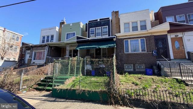 This Cobbs Creek townhouse is being sold strictly in as-is condition via foreclosure, offering a high-potential opportunity for those ready to take on a project. While the home features a traditional three-bedroom, 1.5-bath layout—complete with hardwood floors, a decorative fireplace, and a spacious eat-in kitchen with a breakfast bar—it is being liquidated in its current state with no warranties or repairs provided by the seller. The property includes a fenced front yard, a sizeable front porch, and a large basement previously utilized as a finished space with a powder room and laundry area. Situated on a wide block with ample parking, this asset represents a significant equity play for an investor or contractor capable of navigating a foreclosure sale and restoring the home to its full potential. Schedule your showing today!