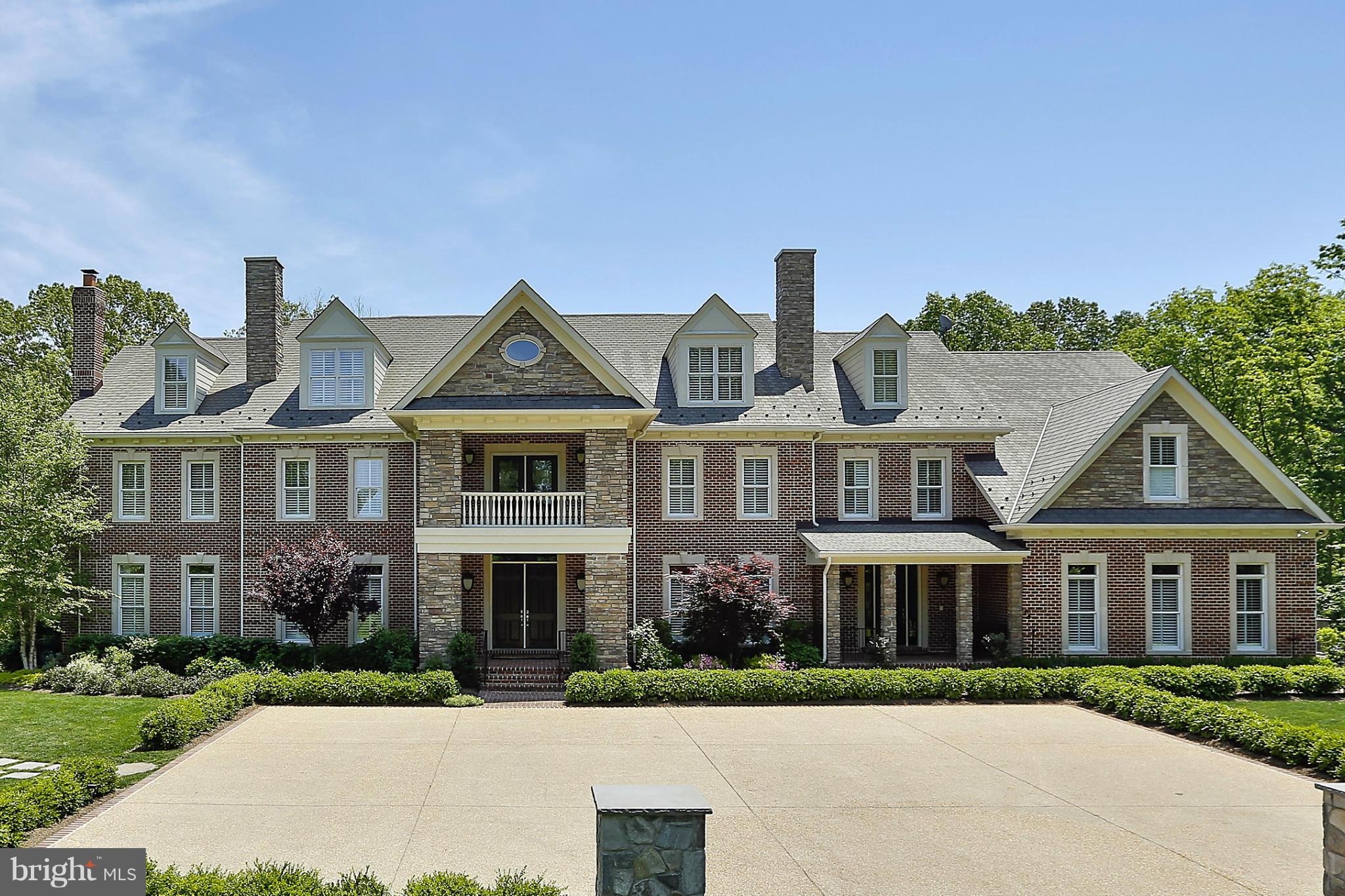 Serene setting on 7.5 manicured acres backing to 5000 acres of parkland.  All brick construction, stunning interior, elevator, walkout lower level, separate detached entertainment pavilion, generator, 2 wells (one just for irrigation), professionally landscaped, courtyard parking, 4-car garage, and so much more!