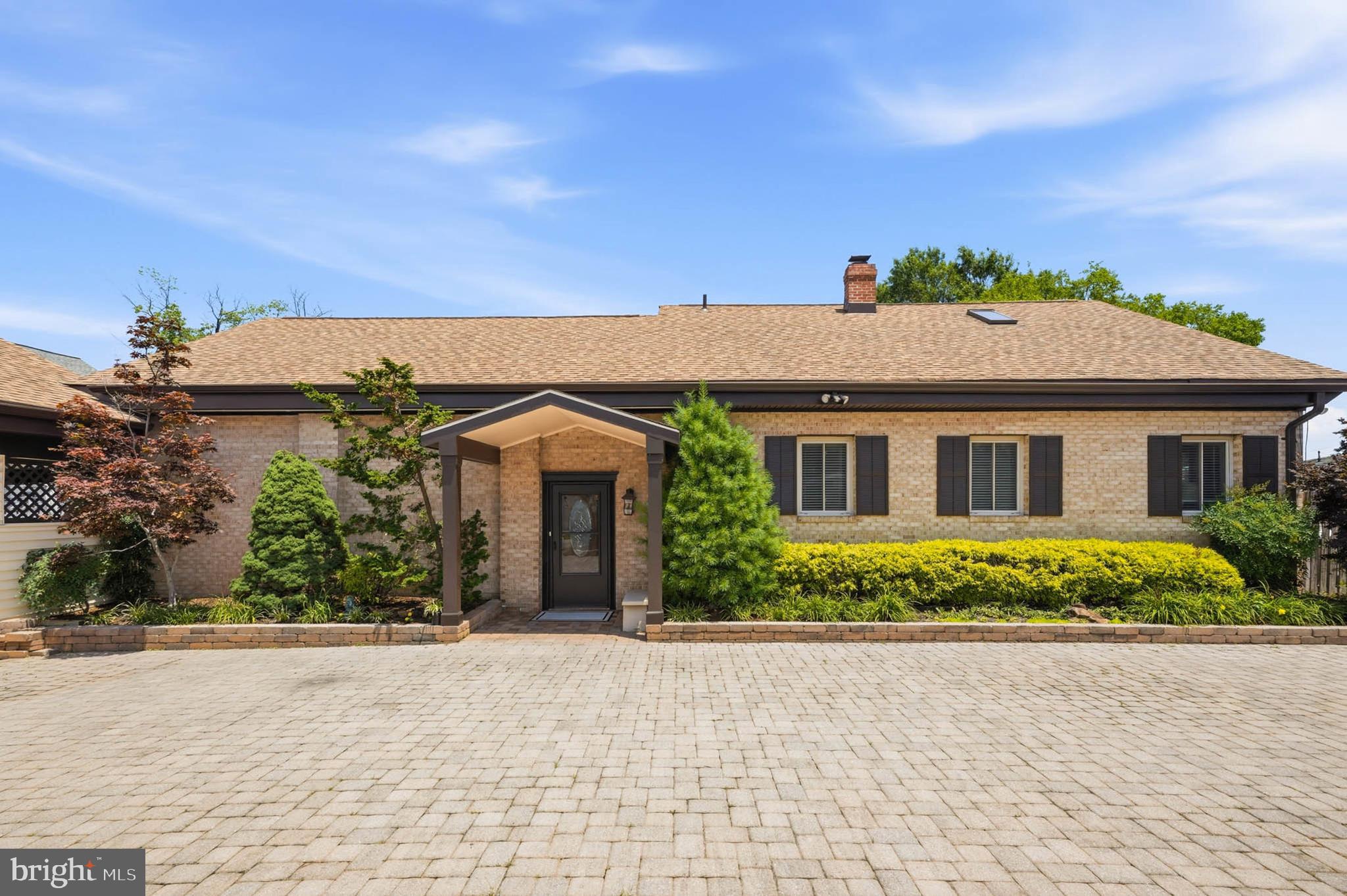 Discover exceptional waterfront living in this remarkable Selby on the Bay residence, where approximately 100 feet of Chesapeake Bay shoreline provides an ever-changing backdrop of stunning sunrises and panoramic water views. Thoughtfully designed for both everyday comfort and entertaining, this spacious home offers an inviting layout that embraces its spectacular setting. The large kitchen features dual sinks and ample workspace, flowing seamlessly into a bright living area anchored by a cozy propane fireplace. A sun-filled waterfront sunroom opens to an additional family room highlighted by beautiful knotty pine ceilings, creating multiple gathering spaces for family and guests.

A dramatic spiral staircase leads to the expansive upper level, where a skylight fills the space with natural light. The primary bedroom serves as a private waterfront retreat, featuring a striking wall of windows that captures breathtaking views of the bay. Throughout the home, thoughtful details abound, including built-in shelving, a dedicated office space, programmable Honeywell thermostats, and ceiling fans throughout the residence and garage. With six bedrooms and three full baths, there is plenty of room for family, guests, and flexible living arrangements.

Designed for entertaining, the home includes a wet bar complete with a sink, dishwasher, and beverage refrigerator, while outside, a spacious stone patio overlooks the water and provides the perfect setting for gatherings. Beautiful landscaping enhances the property, with paver driveways and walkways, fenced front and rear yards, and an elevated vegetable garden adding both charm and functionality. A semi-circular driveway offers abundant off-street parking and a welcoming approach to the home.

For boating enthusiasts, the waterfront amenities are truly extraordinary. A substantial pier, floating dock, bulkhead, and heavy-duty boat lift provide direct access to the Chesapeake, while the oversized boathouse stands as one of the property's most impressive features. Offering protected, high-and-dry storage for your vessel, along with ample space for a workshop, maintenance area, or additional storage, the boathouse delivers everything needed to fully enjoy the waterfront lifestyle. Opportunities to own a Chesapeake Bay property with a boathouse of this size and versatility are increasingly rare.

Adding even more value, the detached two-car garage offers potential as an accessory dwelling unit and includes a separate entrance, full bath, and washer and dryer, ideal for guests, extended family, or potential rental income. A versatile bonus room within the home can easily serve as a game room, media room, playroom, guest suite, or sixth bedroom, adapting to a variety of lifestyle needs.

Located in the highly sought-after waterfront community of Selby on the Bay, residents enjoy exclusive amenities including a private waterfront clubhouse, sandy beach, playground, basketball court, pickleball courts, swimming area, and direct South River access for boating, kayaking, and paddle boarding. The community is conveniently situated near restaurants, shopping, parks, and trail systems, with easy access to Routes 50 and 97, Annapolis, healthcare facilities, and highly regarded schools. With the new Edgewater Community Center coming soon, this exceptional property offers not only a beautiful home but a complete Chesapeake Bay lifestyle unlike any other.