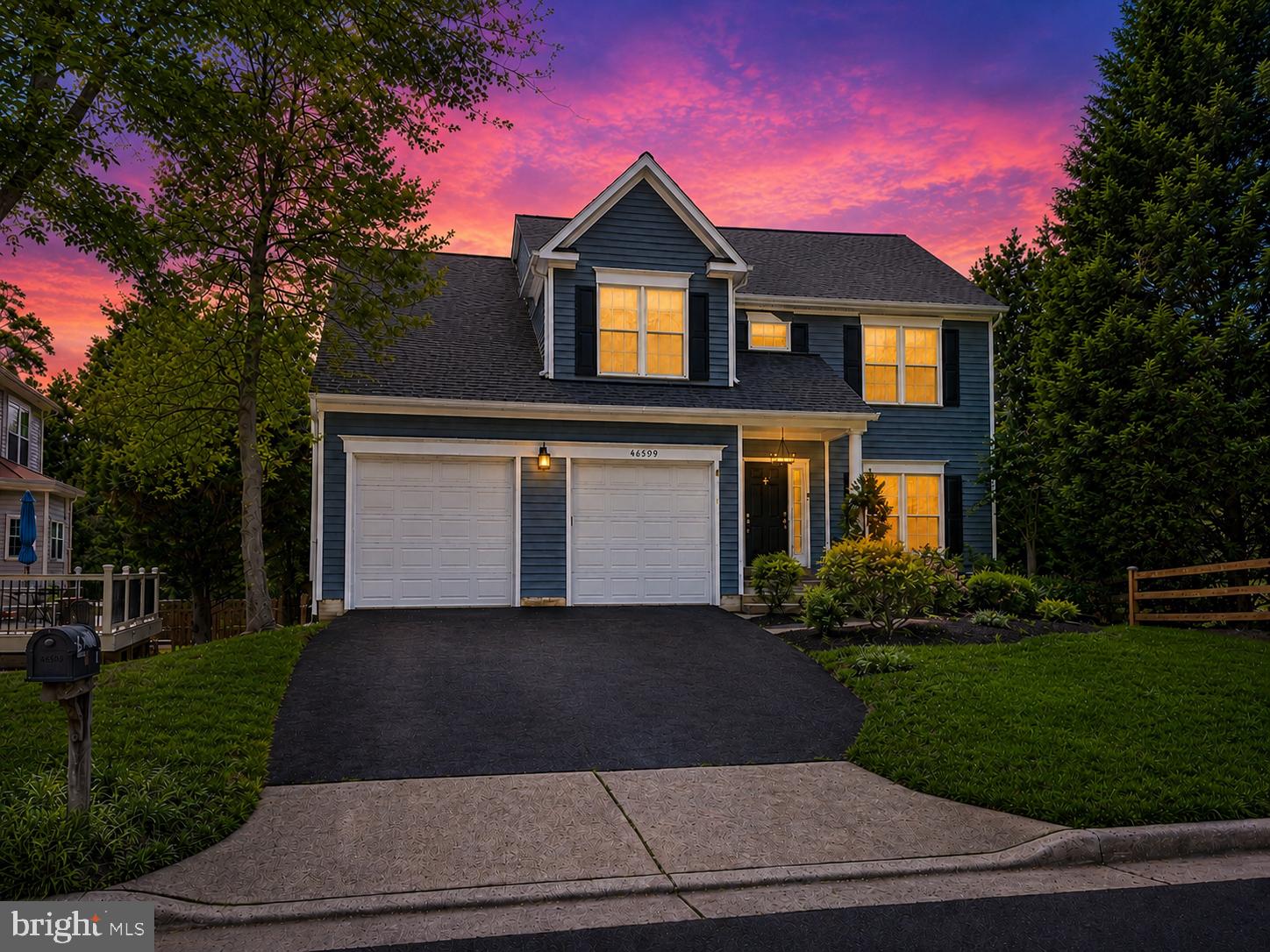 Welcome to 46509 Hollymead Place, a truly exceptional residence in the highly sought-after Potomac Lakes community of Cascades in Sterling, Virginia. Originally selected as the community's model home, this remarkable property combines timeless design, modern luxury, and cutting-edge Tesla-powered energy efficiency in one of Loudoun County's most desirable neighborhoods.
<p>
What truly sets this home apart is the extraordinary level of investment its owners have made, totaling more than $300,000 in improvements and upgrades throughout the property. At the heart of the home's sustainability features is a Fully Paid OFF substantial Tesla energy system valued at approximately $75,000, including Tesla solar panels, dual Powerwall battery backup systems, EV charging capability, upgraded electrical infrastructure, and protective mesh screening. Equipped with two Tesla Powerwalls, this home provides reliable backup power during outages, allowing you to keep essential systems running and enjoy greater energy independence for days.
<p>
This home is a Smart Home all controlled by Apps:  Ring to control outside camera and backyard light, Kasa to control light switches in garage, deck and decklights, Wiz to control lights in formal living room, Govee Home to control lights in Sauna Room, Google Home to control Thermostat and Tesla App to manage garage charger, power walls and solar. 
<p>
Offering over 3,122 square feet of finished living space, this beautifully updated home features four spacious bedrooms, three full bathrooms, and one half bath, including a fully finished lower level with a full bath and a recently installed premium infrared sauna designed for wellness, recovery, and relaxation.
<p>
The home has undergone extensive recent renovations, including a complete exterior transformation featuring a new roof, siding, gutters, soffits, and sliding glass door. Inside, nearly every space has been thoughtfully refreshed with new paint, new carpeting, updated lighting, renovated bathrooms, and contemporary finishes throughout.
<p>
The beautifully remodeled kitchen serves as the centerpiece of the home, showcasing quartz countertops, upgraded cabinetry, designer backsplash, and an impressive suite of newer Samsung appliances, including a smart electric range with Flex Duo technology, Air Fry capability, convection microwave, Bespoke refrigerator, and dishwasher.
<p>
Additional major improvements include a newer Carrier HVAC system with HVAC ultraviolet (UV) light air purifiers that use UV-C light to neutralize airborne microbes like bacteria, viruses, and mold spores as they circulate through your heating and cooling system, repaved driveway, recently replaced washer and dryer, upgraded garage door motors, extensive electrical updates, and the replacement of approximately 90% of the home's interior and exterior light fixtures.
<p>
The lower level has been extensively renovated within the past year and now offers flexible living space complemented by a premium Sunlighten mPulse infrared sauna featuring red light therapy, near-, mid-, and far-infrared technology, ultra-low EMF design, chromotherapy lighting, and advanced wellness features typically found only in luxury spa environments.
<p>
Located within the award-winning Cascades Community Association, residents enjoy access to an impressive collection of amenities, including swimming pools, fitness centers, clubhouses, tennis courts, playgrounds, walking trails, community events, and recreational facilities. The location offers convenient access to shopping, dining, commuter routes, Dulles International Airport, the Potomac River, Algonkian Regional Park, and everything that makes Loudoun County one of Northern Virginia's premier places to live.
<p>
This is more than a home—it is a rare opportunity to own one of the community's original showcase residences, thoughtfully modernized with an extraordinary commitment to quality, efficiency, wellness, and long-term value.
