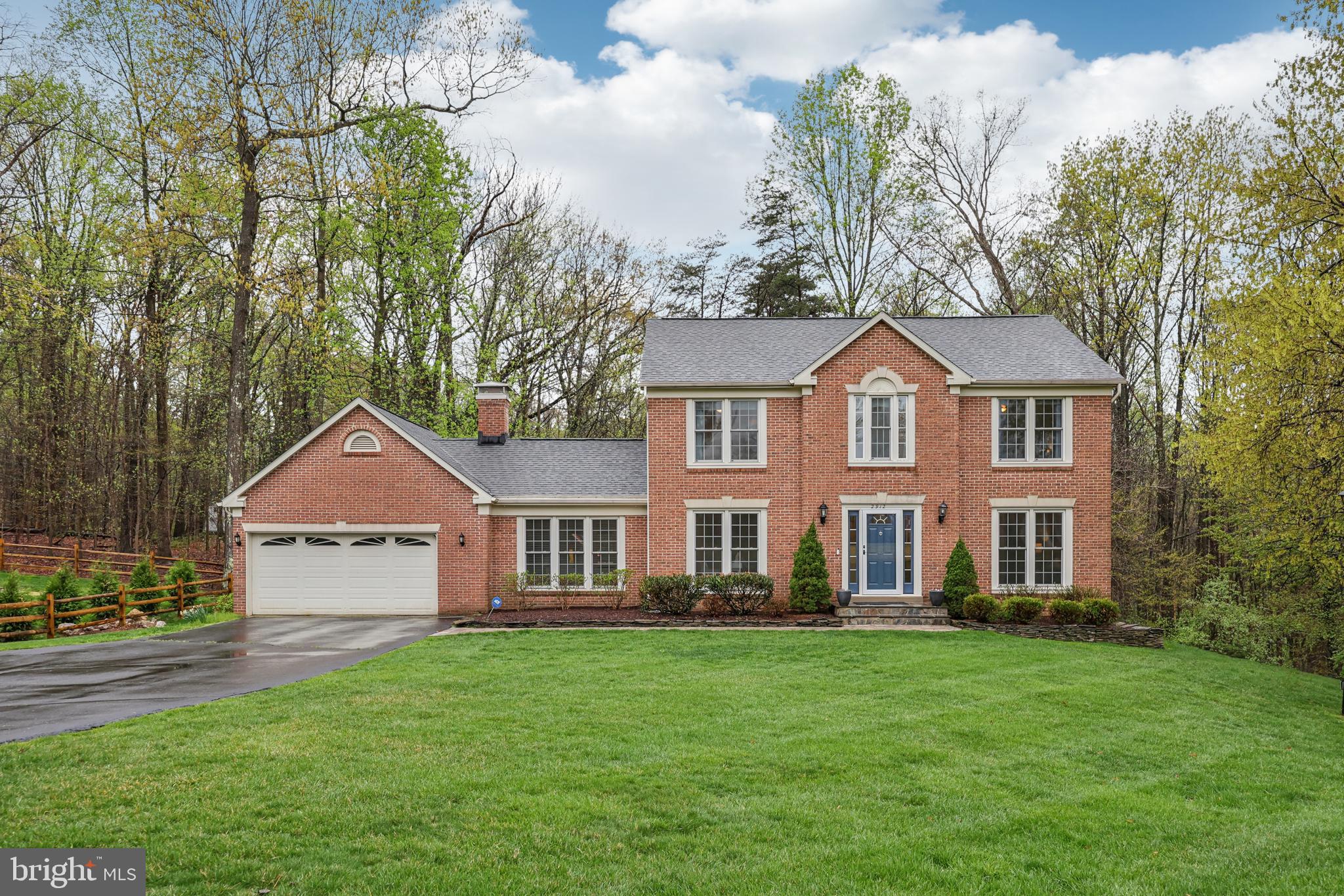 Open House 4/27 3-5pm* Drive down your fairytale tree lined driveway to your charming brick colonial that backs to trees! The home has an amazing front yard for neighborly gatherings along with a private backyard complete with your own custom playset. The foyer welcomes you with Brazilian Cherry hardwood floors and a coat closet. To your left is a private main level office with French doors, custom built-ins, recessed lighting and a wall mounted TV.  To your right is a spacious living room that opens to a dining room with wainscotting and a bay window overlooking the backyard. The kitchen features 42" oak cabinets, granite counters, recessed lighting, Jenn Air appliances including a wall oven, electric cooktop with downdraft, convection microwave, dishwasher, and fridge with built-in trash cans. The kitchen overlooks the eat-in breakfast area that has a bonus bar with beverage center, 2nd sink, and a pantry cabinet with pull out shelves. The kitchen is also open to the vaulted family room which has carpet, a wood burning fireplace, custom wooden blinds, ceiling fan, and has a door to both the 2 car garage and the deck. The deck overlooks the entire yard with stairs down to the patio. The upstairs features a large primary suite complete with two custom closets and an en-suite updated bathroom with two vanities, a large soaking tub, and a walk in shower. There is carpet throughout the upstairs including the three other bedrooms, each with a ceiling fan. The hallway bath is bright with a large window, a tub/shower, and updated vanity. The HVAC was replaced in 2017 and has a 2nd zone for the upstairs - you'll find a 2nd thermostat in the primary bedroom for comfort. The lower level is a walk out with a sliding glass door, fully finished with carpet, a 5th bedroom with 2 closets, an updated bathroom, a bar area with microwave and 2nd full fridge and sink, a den with 2 large storage closets, and the laundry area with side by side washer/dryer and sink. The house sits on a beautiful .71 acre lot with a massive front yard perfect to play on. Oakton has a farmers market on Saturdays (year round) and Wednesdays (May - Oct). The library is close by along with playgrounds, the Giant Shopping center with Starbucks, Tony's, Taco Rock, Bobby's Bagel Cafe, Santini's, Hangry Joe's, Dunkin Donuts, Settle Down Easy Brewery, and local fav, Mama Tigre. Enjoy annual events in nearby Vienna like ViVa Vienna, The Halloween Parade, Oktoberfest, and Chillin' on Church.  No cats, no smokers. Dogs case by case. Lawn care is included!