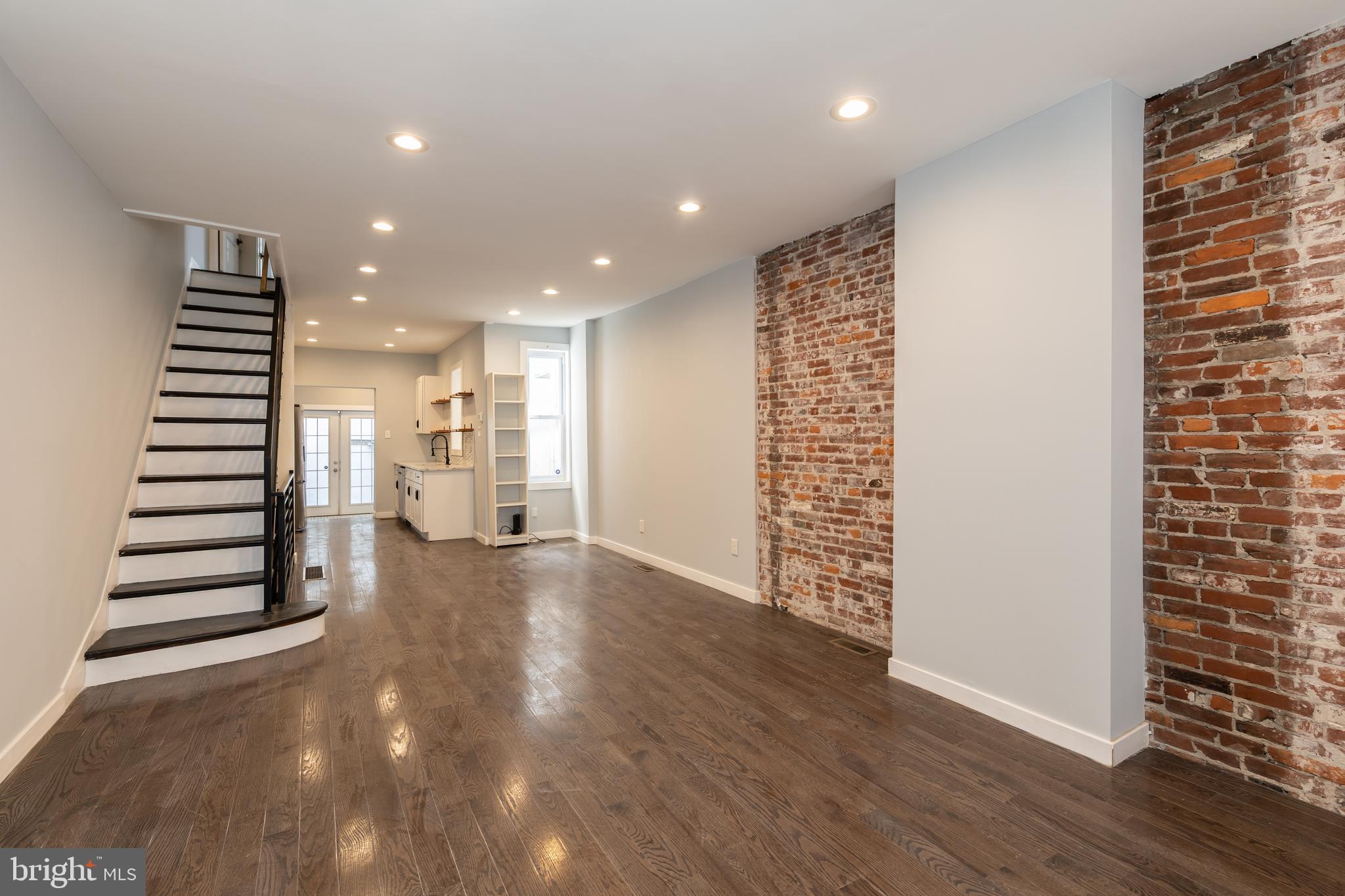 Welcome to this beautifully maintained 3-bedroom home on a quiet side street in the heart of South Philly. Renovated in 2021 and ready to move right in, this home features an open and airy first floor, hardwood floors, central air conditioning, a finished basement, and a bright, clean kitchen.

Step into the spacious living and dining area with room for your favorite couch and a full dining room table for hosting. Enjoy the warm tones of hardwood floors and lovely brick accents and lots of natural light. The space naturally flows into a well designed kitchen and a bonus room, perfect for a breakfast nook or extra storage. French doors open to a cozy rear patio for your morning coffee or a quiet space to unwind in the evening. 

Head upstairs where you'll find three bedrooms with hardwood floors and an updated hall bathroom with a tub/shower. The finished basement extends the living space with an open stairway offering plenty of space for a family room, home office, or workout space, and the convenience of a powder room, laundry area, and additional storage.

Located just one block from Dickinson Square Park, one of the neighborhood's favorite green spaces. Enjoy being close to the cafés and shops of Pennsport and just a short walk to the restaurants along Passyunk Avenue. With easy access to bus routes and I-95, this home offers the perfect combination of comfort, convenience, and location.