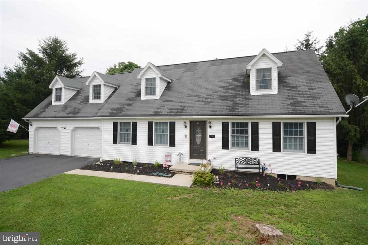 Lots of Living Space -Located on Cul-de-Sac - Country Kitchen with Breakfast Bar - OPEN to Family room - Wood Floors Wood Fireplace & access to Deck & private Yard - Finished Rooms over Garage - 5 Bedrooms + Den could be 6th B/R- Over 2600 sf Living Space - Formal Living with Wood Floors -