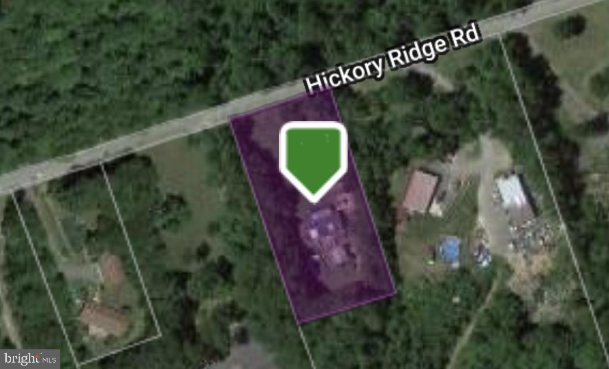 Looking for a wooded lot with wildlife and privacy for your new home?  This location is perfect for you.  No worries about the cost of a septic system, well or running electric to the house... it's already there for you!  Complete with a recreation building/storage area with electric.  Shed remains on the property too.  Call today for more information and to make this location your new address!  Taxes listed are based on the home that used to be on the property.