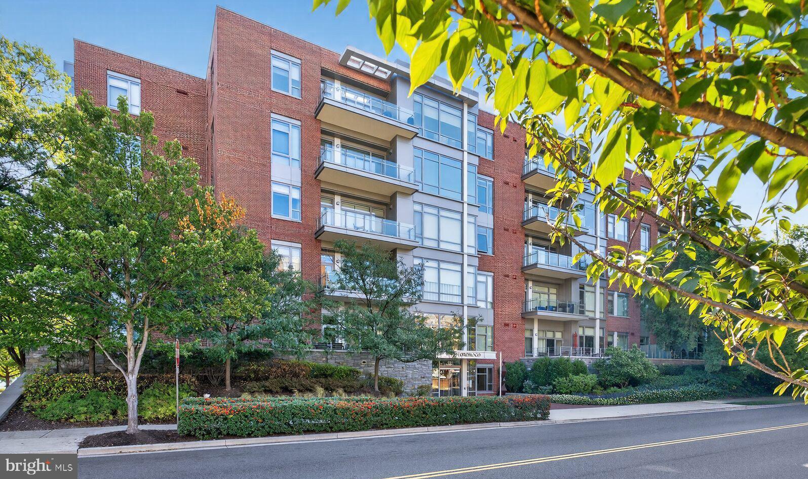 This stunning 2 bedroom, 2.5 bathroom condo is located in The Oronoco, Old Town Alexandria’s premier waterfront residence offering luxury living at its finest. Enjoy seamless indoor/outdoor living on the private terrace overlooking the lovely courtyard with Potomac River views. With over 1,600 square feet, this sophisticated residence features an open floor plan, floor-to-ceiling windows, wide-plank hardwood floors, soaring 10-foot ceilings, and designer finishes throughout. The gourmet kitchen is a chef’s dream, boasting custom cabinetry, a large island, quartz countertops, and top-of-the-line appliances including a Sub-Zero refrigerator and Wolf oven/cooktop. The expansive primary suite is a serene retreat with two spacious walk-in closets and a spa-inspired bath complete with a double vanity, and oversized glass-enclosed shower. The generously sized second bedroom is perfect for guests or a private home office. A second bath with shower/tub, powder room, laundry closet, and ample storage complete the thoughtfully designed layout. The Oronoco offers true five-star living with 24-hour concierge, state-of-the-art fitness center, yoga studio, heated outdoor pool, dog-washing station, children's playroom, a residents’ lounge, and bike storage. Two garage parking spaces and a private storage unit are also included. Located just off the GW Bike Path and Potomac River, steps from the heart of Old Town, less than a mile from the King Street and Braddock Road Metro stations, and only 10 minutes from National Airport. Residents enjoy easy access to waterfront parks, boutique shopping, award-winning dining, historic charm, and proximity to downtown DC. With its unmatched setting, The Oronoco is ideal for residents seeking both convenience and an active lifestyle.