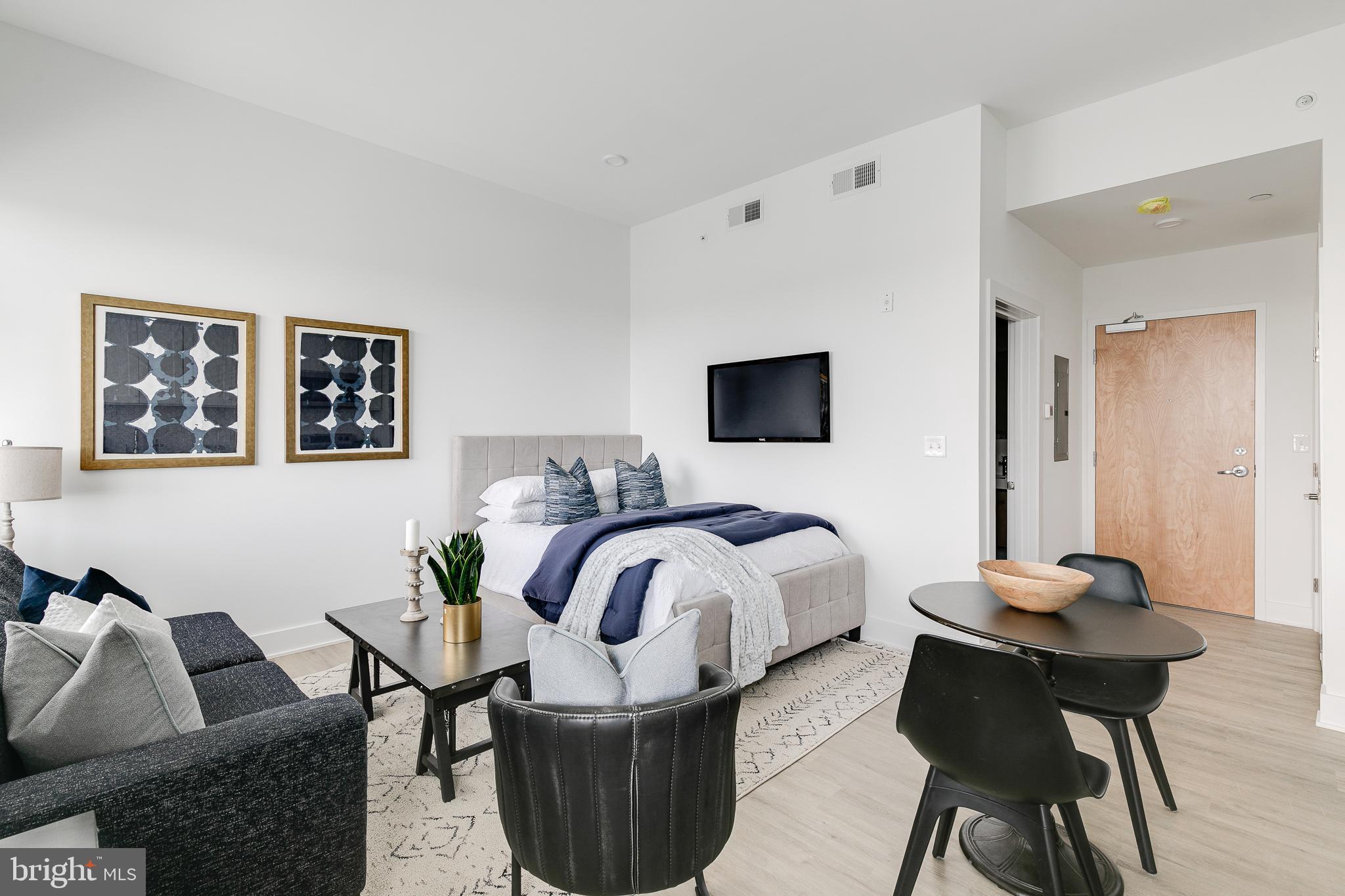 *Available 7/1!*

Don’t miss the chance to live in a beautiful 52-unit apartment building at 2201 Washington Avenue! Situated in the charming Graduate Hospital neighborhood, this building is near many local conveniences, restaurants, and attractions that are sure to make for an enjoyable living experience. The walkability is unparalleled as you can reach the Schuylkill River Park, larger shops like Target and Sprouts Farmers Market, plus mom and pop businesses like The Sidecar Bar & Grille and Loco Pez, all by foot! Public transit is also accessible via Washington Avenue and Broad Street, and you are close to I-76 for zipping in and out of the city.

This sunny studio has a spacious layout and modern finishes including hardwood floors, central AC, in-unit laundry, as well as recessed lighting. Natural light is also abundant with multiple windows. The kitchen is beautifully designed with white cabinetry, quartz countertops, stainless steel appliances and honeycomb backsplash tiling. The contemporary full bathroom features a shower/tub and sleek vanity with a unique lighted mirror. Finally, enjoy building amenities that include a shared roof deck with stunning city views as well as a convenient bike storage room.

Lease Terms: Generally, 1st month, and 1 month security deposit due at, or prior to, lease signing. Other terms may be required by Landlord such as last month’s rent upfront. $65 application fee per applicant. Tenants are responsible for: electricity, gas (if applicable), cable/internet and $10/mo technology fee. Water is a flat monthly fee of $60. Additional fees or requirements may be applicable for units with Homeowners or Condo Associations. Landlord Requirements: Applicants to make 3x the monthly rent in verifiable gross income, credit history to be considered, no evictions within the past 5 years, and must have a verifiable rental history with on-time rental payments. Exceptions to this criteria may exist under the law and will be considered. Cosigners will be considered.

*1 dog OK (max 45 lbs), NO cats. $50/mo pet rent required.
*Photos of a similar unit in the building – finishes will match, layout may differ slightly