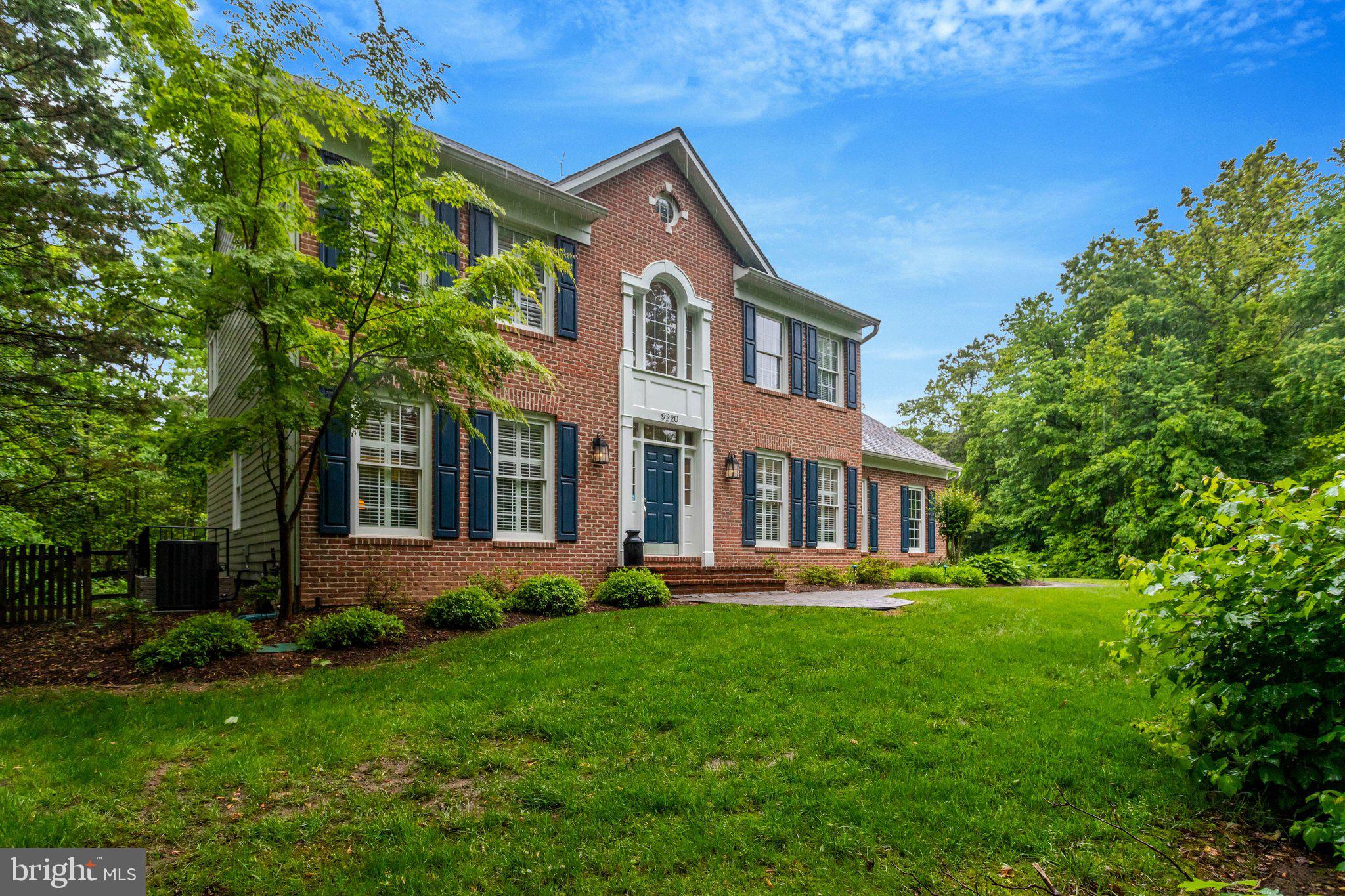Welcome home to your own private retreat! Nestled on a beautifully landscaped and fully fenced one-acre lot, this meticulously maintained home offers the perfect blend of comfort, luxury, and everyday livability. Whether you’re hosting friends poolside, enjoying a quiet morning coffee on the deck, or relaxing among the professionally designed perennial gardens that bloom beautifully through the seasons, this property feels like a year-round getaway. There’s even a concrete pad with electrical already in place for your future hot tub to complete the resort-style backyard experience!

With nearly 4,000 finished square feet, this home features four bedrooms, two full baths, two half baths, soaring foyer ceilings, hardwood floors, and an effortless indoor/outdoor flow designed for entertaining. Elegant formal living and dining rooms provide the perfect setting for holidays and special gatherings, while the heart of the home is the incredible gourmet kitchen featuring SubZero refrigeration and premium Wolf appliances, which include a 5-burner gas cooktop, & wall oven, microwave, and professional-grade exhaust system.

The adjoining breakfast room is filled with natural light thanks to cathedral ceilings, Palladian windows, and French doors overlooking the deck, pool, gardens, and trees. Just off the kitchen, the cozy family room with gas fireplace invites you to unwind, while the private study surrounded by wooded views makes working from home a pleasure.

The thoughtfully designed mudroom/laundry room offers abundant cabinetry, a laundry sink, and easy access to the patio, kitchen, and garage. 

Upstairs, the luxurious primary suite has been beautifully updated with new hardwood floors, two walk-in closets, and a stunning spa-inspired bath renovated in 2022 featuring a soaking tub, separate shower, dual vanities, and exceptional storage. Three additional bedrooms and an updated full bath complete the upper level.

The finished lower level adds even more living space with stylish hardwood-look plank tile flooring, a powder room, and plenty of storage. Exterior major updates include Hardie Board siding (2017), roof replacement (2016), an irrigation system, updated exterior and landscape lighting, deck (2017), pool (2013), and patio.

Beyond the home itself, the location is exceptional! Enjoy miles of walking and biking trails connecting you to shopping, restaurants, and conveniences at The Shoppes at Lorton Valley. Outdoor enthusiasts will love nearby Burke Lake Park, Laurel Hill Golf Club, and the Workhouse Arts Center.  Spend weekends exploring the charming historic town of Occoquan with its boutiques, galleries, restaurants, kayaking, paddleboarding, and seasonal festivals, or enjoy a local favorite at Bunnyman Brewing. Commuters will appreciate easy access to I-95, Fairfax County Parkway, the VRE, The Pentagon, Fort Belvoir, and Marine Corps Base Quantico.  This home is located within minutes of I-95, and the VRE train station.