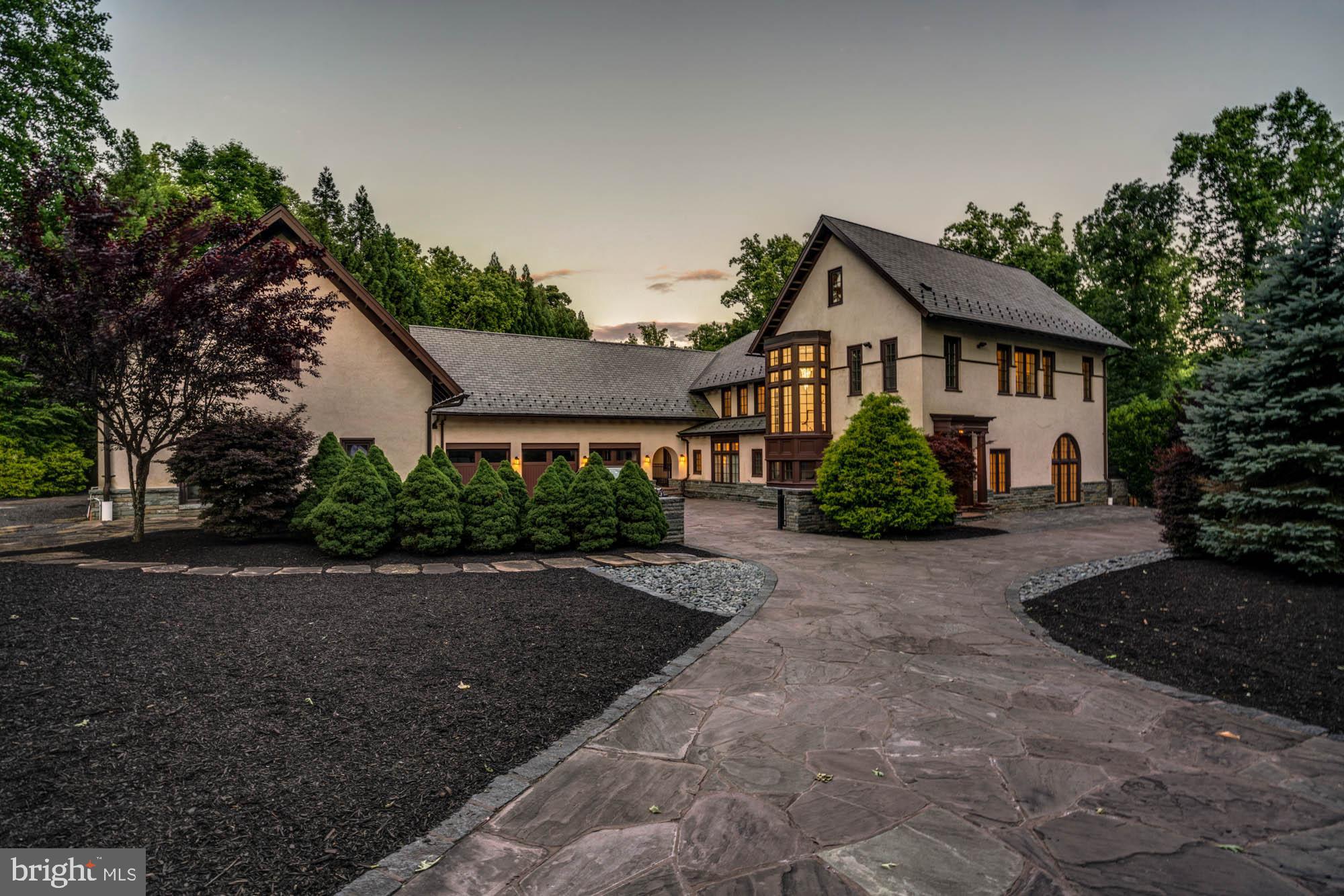 Discover unparalleled luxury in this custom-built corner lot home, nestled within the exclusive Merry-Go-Round community. This magnificent residence boasts an array of exceptional features, including 6 bedrooms, 7 full baths, and 2 half baths.

Upon entry you’ll find a grand living room, a dining room, a versatile home office or guest room, a light filled family room, a chef’s kitchen, a butler pantry, two powder rooms, and a sun-room. The entire main floor of the home overlooks the stunning resort style saltwater pool.

This home’s primary bedroom suite is what dreams are made of. It features wall sconces, a balcony overlooking the pool, and a fireplace. The primary bathroom features dual closets, heated floors, TVs in the mirrors, dual water closets, a rainfall shower, and a spa-like tub.

The largest closet is a heaven of sophistication and organization. Step inside this expansive space, which will transform your wardrobe as if it were a boutique. Adorned with glass closets so you can easily see your entire wardrobe. A central island is perfect for housing your jewelry and accessories. It's a luxurious and well-designed sanctuary that exudes elegance and functionality.

Each bedroom in the home features its own full bathroom including the lofted bedroom on the top floor of the home. The foyer of the home features hidden storage behind wall panels for your convenience.

Revel in the convenience of garage parking for 5 luxury cars as well as a stunning flagstone motor court.

The basement is an entertainer's paradise, featuring a large recreation room with wet bar, a full guest suite, a state-of-the-art movie theater that seats 8 with motorized recliners, and an indoor heated Endless Pool with an automatic retractable cover and a brand-new liner.

The home’s backyard is a masterpiece designed for hosting, featuring a gourmet kitchen equipped with a Viking natural gas grill by the pool, a saltwater pool, and an extraordinary hot tub that accommodates up to 15 people. Whether you choose to swim in the indoor or outdoor pool, you can relax afterward in the soothing steam sauna. If that wasn’t enough, the entire home is outfitted with personal balconies and outdoor space perfect for entertaining.

Enjoy low-maintenance outdoor living with Synlawn synthetic grass installed on the patio and surrounding the pool area. Inside, the home boasts upgraded heated Rehau radiant floors in the family room, primary bedroom closets, primary bath, primary bedroom, kitchen, and loft bathroom. Experience the wow factor with hidden TVs embedded in the mirrors of the primary closets and the basement entertainment center. The home also includes five brand-new A/C units, new thermostats, with a SEER 16 compressor unit for the loft. A whole house generator also conveys with the property for maximum convenience.

Merry-Go-Round Farm spans 204 scenic acres, offering breathtaking views of the Potomac River. This unique community, with only 81 homesites divided into five sections, features homes averaging three-quarters of an acre, perfectly integrated into a meticulously preserved natural setting. The common grounds include an equestrian center with two well-maintained stables, ample pasture, miles of forest trails for hiking and riding, three small lakes, tennis courts and several expansive fields ideal for picnics in warm weather and cross-country skiing or sledding in winter. Onsite groundskeepers and barn staff care for the land and horses under the direction of a Homeowners' Association, of which all residents are members.