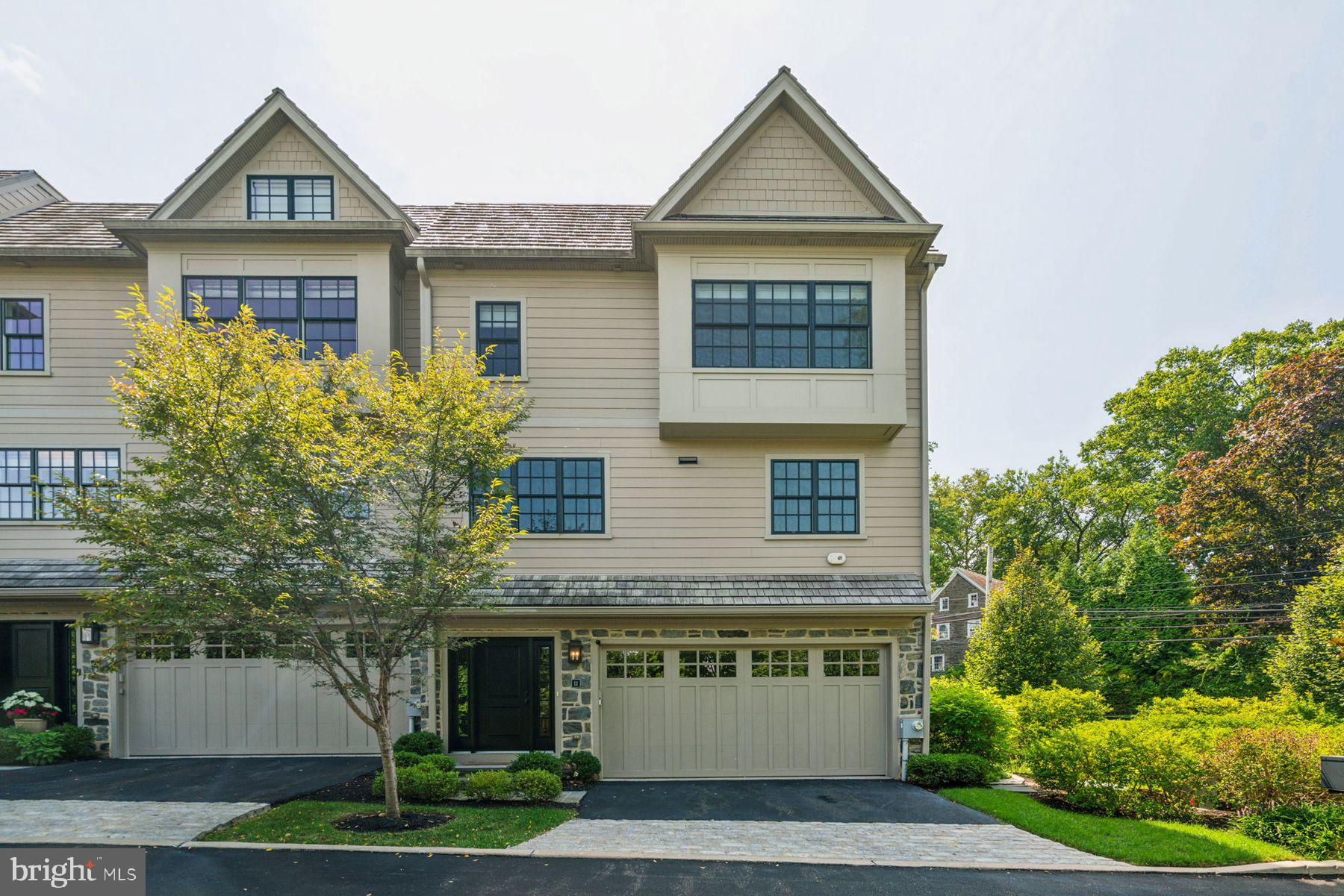 Experience refined living in this exceptional, highly customized end-unit townhome in The Overlea Townhomes by Blake Development, one of Erdenheim’s most desirable communities. Built in 2018 and set on beautifully manicured grounds directly across from the Morris Arboretum, this residence offers a rare blend of luxury, privacy, and convenience.  From the moment you step inside, the home impresses with its thoughtful design and superior craftsmanship. Soaring ceilings, wide-plank walnut flooring, and striking architectural details create an immediate sense of warmth and sophistication. The expanded chef’s kitchen is both functional and stunning, featuring custom cabinetry, climate-controlled wine storage, and top-tier Wolf, Sub-Zero, and Miele appliances - perfect for everyday living and effortless entertaining.  An in-home elevator services all four levels, offering comfort and flexibility for modern lifestyles. The sun-filled entry level provides a versatile space ideal for a home office, family room, or guest retreat, complete with an adjacent powder room. Outdoor living is just as inviting, with a large covered balcony and a flagstone terrace, ideal for morning coffee, alfresco dining, or unwinding with tranquil views.  The upper levels feature a luxurious primary suite with a spa-like bath and expansive walk-in closets, along with three additional generously sized bedrooms, two full baths, and abundant storage throughout. Upper level laundry adds everyday convenience, while multiple spaces easily accommodate private home offices.  This upgraded former model unit leaves nothing to be desired, boasting a heated two-car garage with additional storage, radiant heat flooring, designer lighting, high-end hardware, and a whole-home central sound system with speakers on every level-including the balcony.  Ideally located just minutes from the shops and dining of Chestnut Hill and Wyndmoor, with easy access to Center City, major roadways, and public transportation, this home delivers luxury living in a truly unbeatable setting.  A rare opportunity to own a move-in-ready, impeccably appointed home in one of the area’s most coveted locations - schedule your private showing today.  Please note that property taxes may be eligible for appeal and more information can be provided upon request.