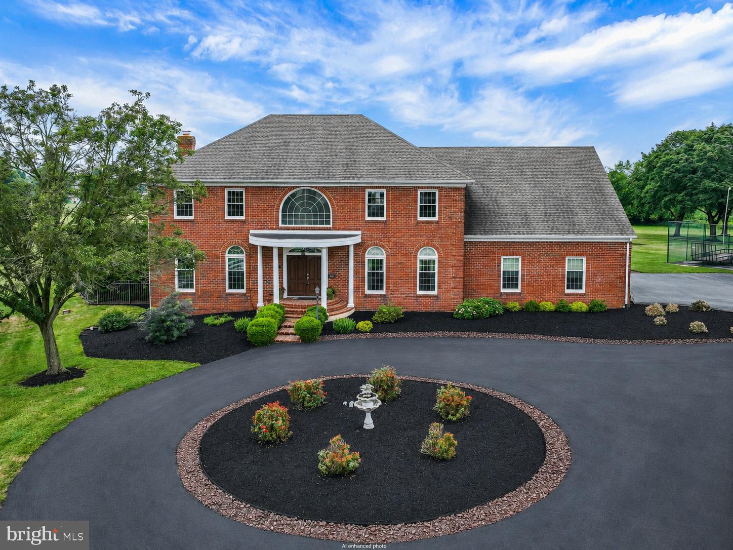 Welcome to your own private resort! Nestled on 3 beautiful acres, this stunning all brick Colonial offers 5 bedrooms, 3 full baths, 1 half bath, and thoughtful updates throughout. A grand two story foyer welcomes you inside, and just beyond, you'll find a Landis Custom Kitchen with quartz countertops. The entire house has received fresh paint and new carpet throughout. Upstairs, double doors lead into a luxurious owner's suite, primary bath featuring a glass walk-in shower with a spa inspired soaking tub, an oversized walk-in closet, and a separate shoe closet. There are four additional spacious bedrooms boasting double closets in each room. The partially finished lower level offers a theater-style family room, full bath, can’t forget about the built-in sauna, and an additional flex space that could become your very own poker room, game room, gym, or ultimate man cave. The possibilities are endless.

When you step outside, you'll discover the true showstopper. This award-winning backyard oasis, recognized in the 2016 York County Parade of Homes for Exterior and Landscaping, was designed for entertaining and everyday living. Enjoy the covered outdoor bar and kitchen, additional covered patio, hot tub building, in-ground pool with water features, fire pits, in-ground trampoline, and a three season half bath. Why book a vacation when the resort is right outside your back door? Once you've experienced a sunset from your own private retreat, you'll never want to leave. This home also features app-controlled permanent exterior LED lighting, perfect for everyday architectural accent lighting, holidays, game days, and special occasions.

The possibilities continue with a one of a kind bank barn featuring a full size basketball court on the upper level and a finished lower level ideal for a game room, fitness studio, or endless other uses. The unfinished portion provides ample space for a workshop, additional storage, or automotive projects. Dreaming even bigger? Imagine transforming this incredible structure into a breathtaking event or wedding venue. The existing tennis court can easily be upgraded for today's pickleball enthusiasts, while the 4,000 square foot pole building with a brand new roof is perfect for car collectors, hobbyists, contractors, or anyone needing exceptional storage space.

Located just 20 minutes from I-83, this extraordinary property offers the perfect balance of complete privacy and convenient access to Harrisburg, York, shopping, dining, and everyday amenities.

This is more than a home. It's a lifestyle. A place where unforgettable memories are made. Schedule your private tour today!