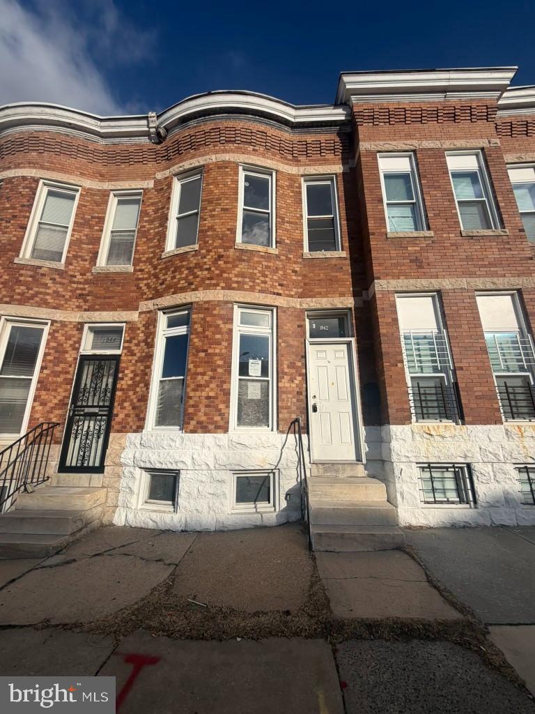 This brick townhome in the neighborhood of Midtown Edmondson offers a wonderful opportunity to buyers looking for an affordable home they can live in and update over time or addition to any investor's portfolio to renovate and hold or flip. The main level of this home features a sun filled living room with a bay window and through a decorative archway you're lead to either the separate dining room or a main level bedroom (you decide). Continue and you will find a half bath and towards the back is a nice sized kitchen which offers access to the fenced backyard. The second level showcases three bedrooms and a full bathroom. The unfinished basement is large and awaits your design and personal touch to expand additional living space. The home is situated in West Baltimore which is centrally to a strip of local retail along Edmondson Avenue corridor, and green spaces such as the Lafayette Square and Harlem Park. It also lies within proximity to evolving districts like Upton and the West Baltimore Innovation District. The property’s location also offers easy access to the major traffic artery via Edmondson Avenue.