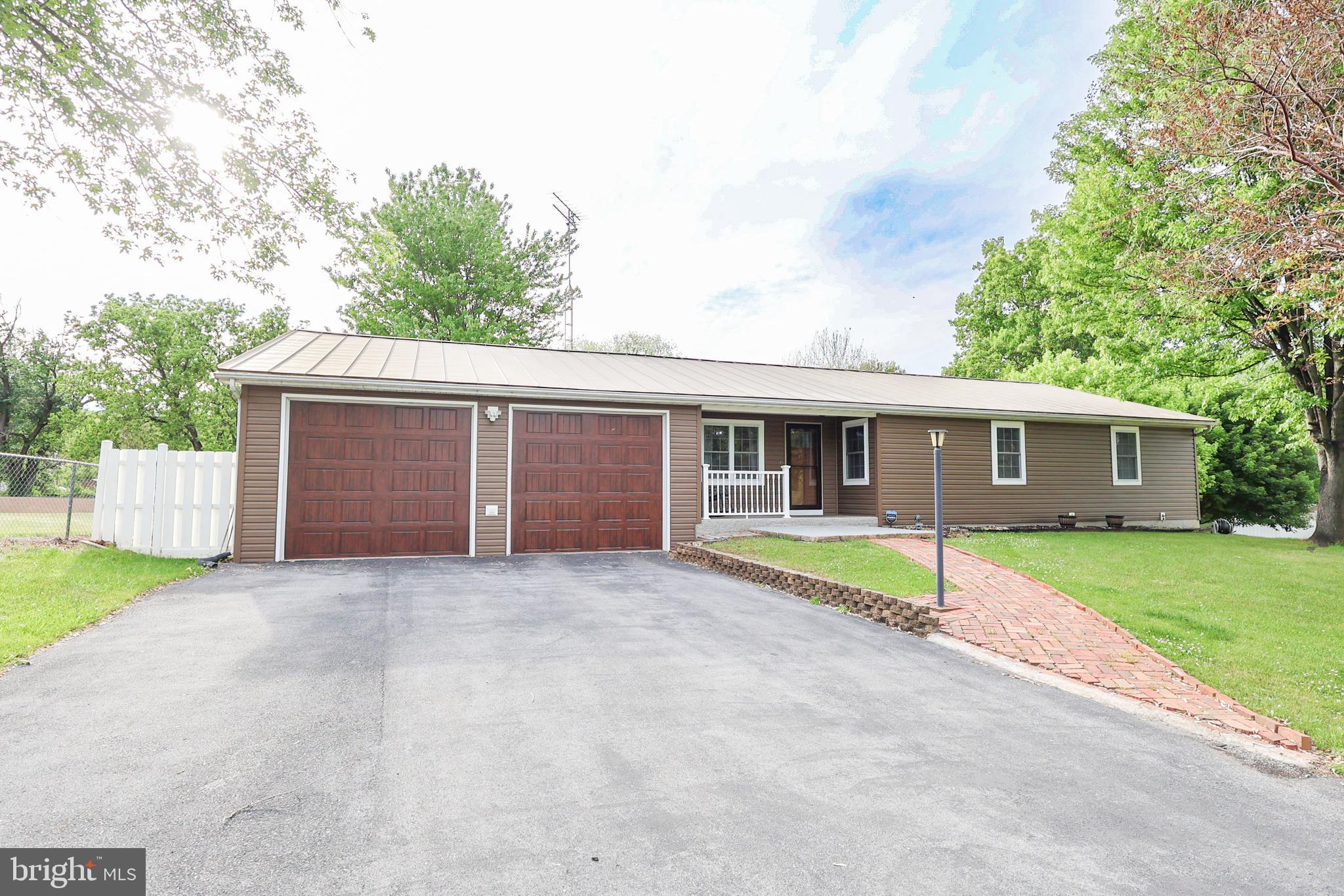Welcome home to this beautifully updated ranch-style residence offering the perfect blend of comfort, functionality, and modern open-concept living. Featuring 3 spacious bedrooms and 3.5 bathrooms, this home provides plenty of room for everyday living, entertaining, and relaxing. The bright and inviting main level boasts an open floor plan with updated appliances, a generously sized kitchen, convenient main-level laundry, a large half bath, and an oversized walk-in pantry providing exceptional storage space.

The fully finished basement expands the living area even further with abundant room for recreation, guests, or multi-generational living, complete with a full bathroom and kitchenette for added flexibility and convenience.

Step outside and enjoy the expansive fenced-in backyard, perfect for gatherings, pets, gardening, or simply unwinding while taking in the peaceful surroundings of this quiet neighborhood. Ideally situated just minutes from downtown Martinsburg and with quick access to I-81, this location is ideal for commuters while still offering a serene residential setting. This move-in ready home truly has the space, charm, and convenience you’ve been searching for!