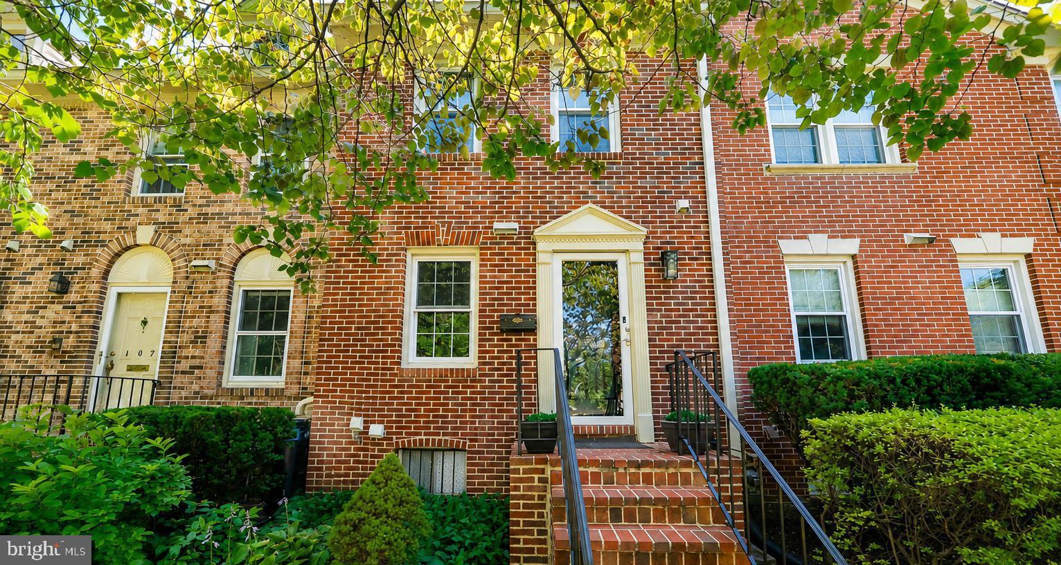 • Welcome home to 109 Great Falls St in the heart of sought-after Falls Church City — a beautifully maintained 3-level brick townhome offering timeless character, functional living spaces, and an unbeatable walkable location just moments from everything Falls Church City is known for, including the Falls Church City school pyramid.
• MAIN LEVEL LIVING & DINING: The main level features sparkling hardwood flooring throughout the spacious living and dining room combination, creating a warm and inviting atmosphere for everyday living and entertaining. The living room is anchored by a charming wood-burning fireplace and flows seamlessly to the outdoor entertaining space through elegant glass doors.
• KITCHEN: Bright and functional kitchen featuring stainless steel appliances, a new vent hood, tile flooring, ample cabinetry, and convenient access to the dining area for easy everyday living.
• PRIVATE OUTDOOR SPACE: French doors open directly to the private fenced rear paver patio, creating the perfect outdoor retreat for dining al fresco, entertaining guests, gardening, or simply relaxing outdoors.
• PRIMARY SUITE: Spacious upper-level primary suite featuring elegant coffered ceilings, generous closet space, and an ensuite bathroom complete with a Jacuzzi soaking tub and separate walk-in shower.
• SECOND UPPER-LEVEL SUITE: Exceptionally spacious second bedroom that lives like an additional primary suite, featuring its own private ensuite bathroom, ceiling fan, and excellent closet space.
• LOWER LEVEL: Fully finished lower level featuring built-ins, a full bathroom, laundry area, and additional storage space. Ideal for a recreation room, home office, guest suite, gym, or flexible living area.
• ADDITIONAL FEATURES: Brick exterior, hardwood flooring on both main & bedroom levels, wood-burning fireplace, new lighting throughout, private fenced patio, lower-level laundry, abundant storage, and thoughtful living spaces throughout.
• LOCATION & LIFESTYLE: Ideally located in the heart of Falls Church City, just blocks to the Falls Church Farmers Market, W&OD Trail, Cherry Hill Park, library, Whole Foods, State Theatre, coffee shops, local restaurants, and boutique shopping. Commuters will appreciate convenient access to both East Falls Church Metro and West Falls Church Metro, along with major commuter routes, including Route 66, Route 7, Route 50, and Broad Street, providing easy access to Washington, DC, Arlington, Tysons, and surrounding Northern Virginia destinations.
• This exceptional townhome offers the perfect blend of comfort, convenience, charm, and location — WELCOME HOME!