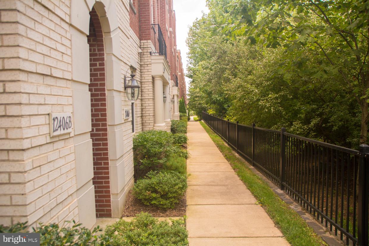 Investment Opportunity: Property has been rented for 2 years for $3100/month - Ready cashflow 
Priced aggressively at $579,000, this expansive 2,188 sq. ft., 2-level townhouse-style condo in the highly sought-after East Market community is the deal you’ve been waiting for. The seller is offering this phenomenal value for a quick turnaround, presenting a rare opportunity to secure a premium property well below recent neighborhood benchmarks. Act fast—this property is concurrently listed for rent, and this purchase opportunity will disappear the moment a lease or contract is signed!

This move-in-ready home lives like a townhome, featuring a 1-car attached garage, an open-concept main living area, and dual private balconies. It has been lovingly maintained with several thoughtful updates integrated throughout recent years. To make it truly turnkey for the new owners, the entire unit will be freshly painted as soon as the current tenants vacate on April 30th.

Enjoy the ultimate convenience of East Market living—literally steps away from Whole Foods, Starbucks, and premier dining at Fair Lakes Center. Commuters will love the complimentary community shuttle to the Vienna Metro and instant access to I-66 and the Fairfax County Parkway.

Do not miss out on this incredible price point. Schedule your tour today before it’s gone!