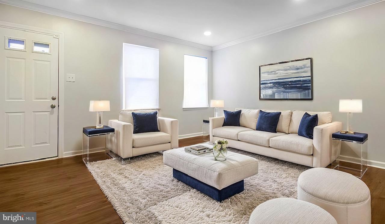 READY TO SELL.  MAKE AN OFFER!! This recently renovated interior townhome boasts beautiful laminate wood flooring throughout the living areas and bedrooms, while the bathroom features updated ceramic tile. The modern kitchen is equipped with granite countertops and a stylish subway tile backsplash.

Designed with an open-concept layout, the living and dining areas seamlessly connect to the kitchen, creating a welcoming and functional space. The home also offers central air and heating for year-round comfort and is conveniently located near downtown Baltimore.

This is the perfect home to start your homeownership journey!