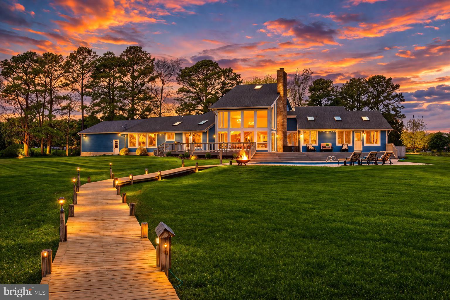 Welcome to the pinnacle of waterfront living in Cove Creek Club—one of Kent Island’s most sought-after and low-turnover communities. What truly sets this property apart is what so few homes here can offer: direct navigable waterfront with a private pier. While many homes in the community enjoy water views, only a select few provide the ability to keep your boat right out back with protected, calm waters and easy access to the Chesapeake Bay. Whether it’s sunset cruises, paddleboarding from your backyard, or spending the day on the water, this home delivers the true Eastern Shore boating lifestyle.

Extensively renovated and spanning over 4,200 square feet, this one-level residence has been completely reimagined with high-end updates throughout. The renovation included an impressive 1,000-square-foot addition and the addition of a rare 3-car garage, creating exceptional space for both everyday living and waterfront storage needs. The layout features four spacious bedrooms, four full baths, a private study, and a stunning modern addition completed within the last three years. Major improvements include new Hardie Board siding and a high-efficiency three-zone HVAC system for comfort and peace of mind.

Outside, your private retreat awaits with an in-ground pool, expansive entertaining decks, and wide-open views overlooking the protected marina basin. The setting is peaceful, private, and designed to embrace waterfront living at every turn.

Beyond the home itself, Cove Creek Club is a true lifestyle destination. One of the community’s biggest draws is the unlimited golf included in the HOA, featuring a private 9-hole course played as 18 with multiple tee boxes, along with a driving range and practice areas. Residents also enjoy a marina, boat storage, tennis and pickleball courts, a fitness center and gym, clubhouse, private sandy beach with fire pits, and beautifully maintained grounds surrounded by tidal creeks and the Chesapeake Bay.

All of this is tucked away in a quiet waterfront setting while still offering convenient access to Route 50 for easy trips to Annapolis, Washington DC, and the beaches.