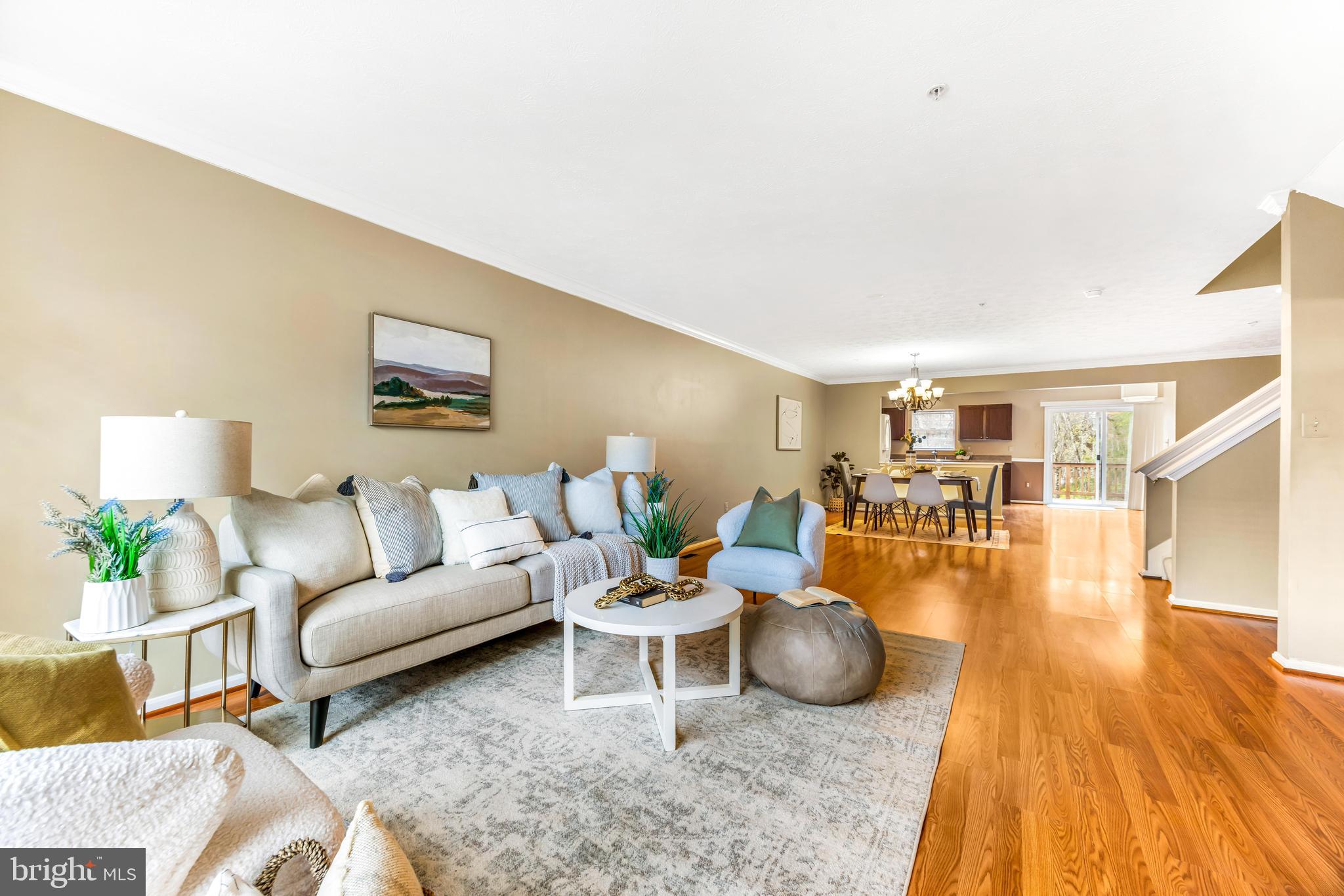 Welcome to this immaculate 3‑level townhome in Newtown! Featuring 3 bedrooms, 3 full baths and 1 half bath, this home boasts a two‑story bump‑out and open‑concept main level with hardwood floors, an eat‑in country kitchen and sliders to a private deck. The fully finished lower level offers a gas fireplace, recessed lighting, a full bath, walk‑out access and abundant storage—ideal for a media room, home office or guest suite. Upstairs, the primary suite impresses with tray ceilings, dual closets and a spa‑inspired bath. Shows like a model—don’t miss it!