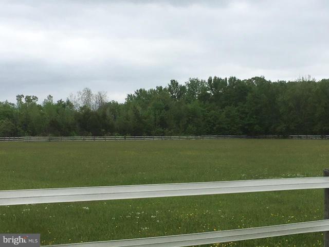 Beautiful 8.44 Acre lot, cleared & fenced, ready for horses,livestock, build your dream house! Entrance of Wedding Drive, has gated entrance off of Gunston but this is for Ag. use only, can't be for house entrance.  Approved Perc. Level lot.