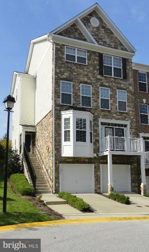 Like new & lovely town house in Russett.  4 levels w/3bdrms, 2.5 baths; kitch w/hdwd flrs, stn steel apps, granite countertops,  2 pantries & 2 ovens; gas fireplace in living room with crown, and dining rm w/crown and chair rail moldings; balcony; washer/dryer; large mstr bdrm w/spacious walk-in closet; jetted tub, separate shower & dble sinks in master bath; 1-car garage; available immediately.