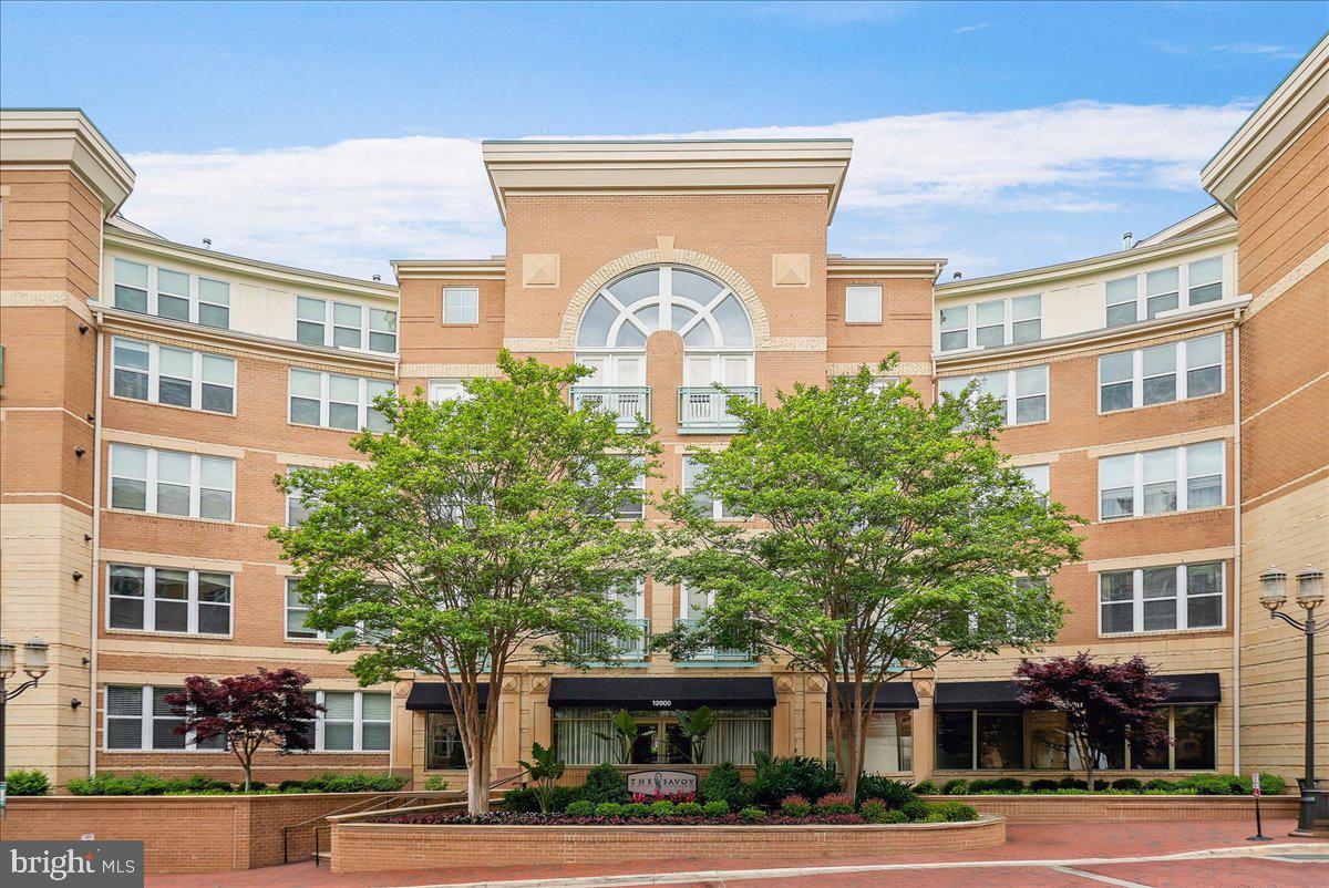 HOMEOWNER. There's something about that word that conjures up pride and not a little excitement. "Stop by MY place" has a totally different feel, doesn't it?  The only thing better would be an awesome place to call home.  This is "the one." Located in Reston Town Center, there's always something to do and it's nearly always in WALKING DISTANCE. Restaurants, shopping. It's all there. The Metro stop is a 0.6 mile walk. Trader Joe's is under a 1 mile walk. On the rare occasion you need to drive, you have your very own parking space in the parking garage. Your home is stunning! From granite countertops to beautiful floors, you have everything you imagined.