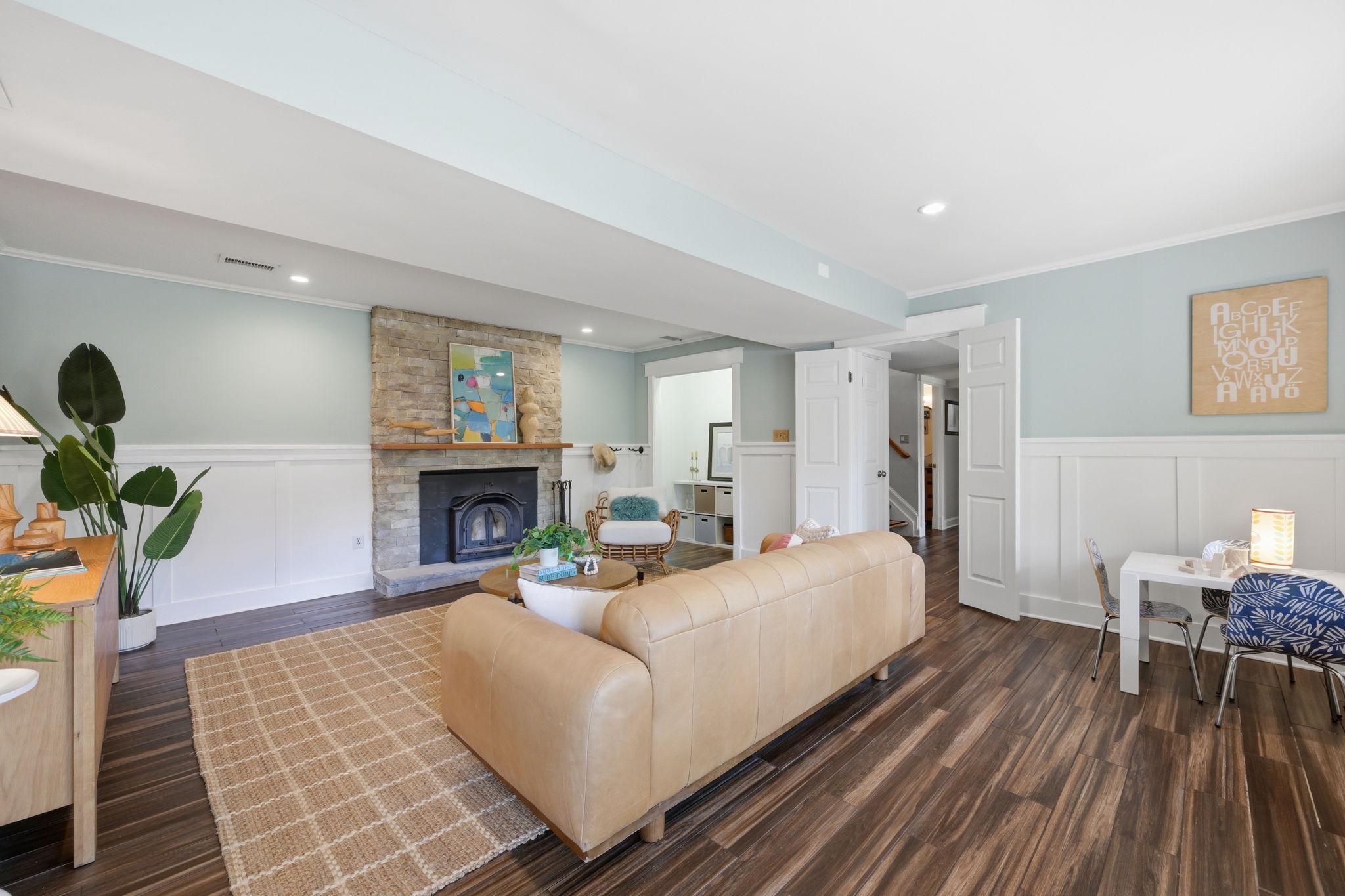 OH MY - TAKE A LOOK - the updates and renovations speak for themselves - Stunning home filled with upgrades & so much natural light.  Two level contemporary home with amazing square footage, an easy & open floor plan and sited on a quiet & picturesque lot.  See video and floor plans and hot tub! 

What a gem - the Kitchen & renovations are amazing!  Plus an open floor plan with two entrances to the Kitchen -from the Dining Room area & from the Family Room!  Discover refined contemporary living on a serene, professionally landscaped .37-acre lot in highly sought-after Glen Park community in Potomac—perfectly positioned in the top-rated Winston Churchill High School district.
Step inside this thoughtfully renovated home and feel the seamless blend of modern elegance and everyday comfort. Curb appeal shines with an expansive flagstone front patio framed by elegant stone walls, welcoming you home. 

DON'T MISS THE ATTACHED GARAGE WITH ENTRANCE FROM THE FRONT COVERED WALKWAY. 

The lower-level impresses with a bright, daylight recreation room featuring recessed lighting, custom millwork, a cozy wood-burning stove insert fireplace, and a wall of windows overlooking the lush yard. A versatile 4th bedroom (or ideal home office) includes a custom walk-in closet, recessed lighting, and clever under-bench storage. A designer full bath with soapstone-topped vanity, plus a convenient laundry room with sink, extended Quartz counters, cabinetry, washer/dryer, and utility space, completes this flexible level.

Ascend the custom contemporary stairway to the sun-drenched main level, where an open-concept layout flows effortlessly. The soaring-ceiling living room with hardwood floors opens to a front balcony via Andersen sliders. The dining room connects seamlessly to the chef’s kitchen and family room.
The upgraded kitchen is a standout with granite counters, GE Café French-door refrigerator, six-burner gas range with double ovens, custom range hood, Fisher & Paykel two-drawer dishwasher, stainless farmhouse sink, tile backsplash, abundant custom cabinetry, recessed lighting, and a built-in microwave. Adjacent breakfast area with Andersen sliders leads to a flagstone patio.

Unwind in the expansive family room spanning the rear, with recessed lighting, ceiling fan, and sliders to a low-maintenance deck and covered pergola. Outdoor entertaining reaches new heights with a built-in commercial grilling system, gas grill, custom wood oven, and a relaxing hot tub.

Luxury awaits in the primary suite: king-sized space with two large closets (one walk-in), ceiling fan, recessed lighting, and serene views. The spa-like primary bath features an oversized walk-in shower with bench, niche, shelf, and dual Quartz vanity. Two additional generous bedrooms offer walk-in closets, custom benches, ceiling fans, and recessed lighting. A renovated full bath with Quartz tops and tub/shower combo, plus two linen closets, serves the level perfectly.

Notable updates include: 50-year Owens Corning Architectural roof (2013); HWH (2019; HVAC (2014); compressor (2024); custom window treatments through-out the home, plus French drain at rear, and extra driveway parking.

Minutes to I-495, I-270, I-370, Bethesda, Rockville, D.C., Virginia, Cabin John Shopping Center, Potomac Village, Park Potomac, Crown, Fallsgrove, parks, and top dining—enjoy prime convenience without sacrificing peaceful suburban charm. Beautiful home - turn key! Don't miss the hot tub.

Furniture on line pics shows how placement of furniture can be done. Funriture no longer in the home.