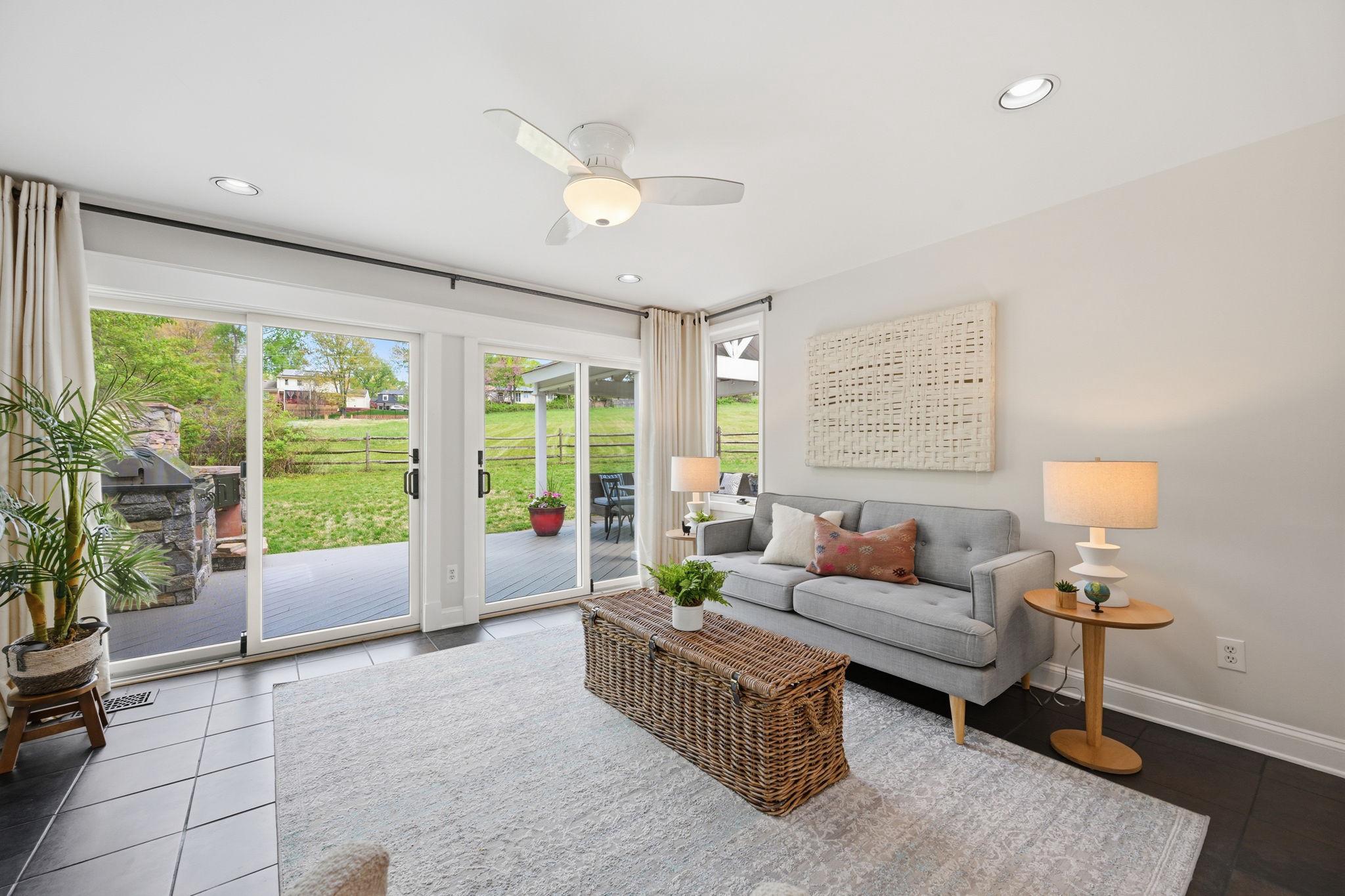 OPEN SUNDAY 5/31,  1-3    OH WOW---NEW PRICE!!!!!!   IN CASE you missed this - we now have a price adjustment!  SELLRS ARE MOTIVATED TO SELL! This stunning home will not disappoint. The updates and renovations speak for themselves - Stunning home filled with upgrades & so much natural light.  Two level contemporary home with amazing square footage, an easy & open floor plan and sited on a quiet & picturesque lot.  See video and floor plans and hot tub!

What a gem - the Kitchen & renovations are amazing!  Plus an open floor plan with two entrances to the Kitchen -from the Dining Room area & from the Family Room!  Discover refined contemporary living on a serene, professionally landscaped .37-acre lot in highly sought-after Glen Park community in Potomac—perfectly positioned in the top-rated Winston Churchill High School district.
Step inside this thoughtfully renovated home and feel the seamless blend of modern elegance and everyday comfort. Curb appeal shines with an expansive flagstone front patio framed by elegant stone walls, welcoming you home. 

DON'T MISS THE ATTACHED GARAGE WITH ENTRANCE FROM THE FRONT COVERED WALKWAY. 

The lower-level impresses with a bright, daylight recreation room featuring recessed lighting, custom millwork, a cozy wood-burning stove insert fireplace, and a wall of windows overlooking the lush yard. A versatile 4th bedroom (or ideal home office) includes a custom walk-in closet, recessed lighting, and clever under-bench storage. A designer full bath with soapstone-topped vanity, plus a convenient laundry room with sink, extended Quartz counters, cabinetry, washer/dryer, and utility space, completes this flexible level.

Ascend the custom contemporary stairway to the sun-drenched main level, where an open-concept layout flows effortlessly. The soaring-ceiling living room with hardwood floors opens to a front balcony via Andersen sliders. The dining room connects seamlessly to the chef’s kitchen and family room.
The upgraded kitchen is a standout with granite counters, GE Café French-door refrigerator, six-burner gas range with double ovens, custom range hood, Fisher & Paykel two-drawer dishwasher, stainless farmhouse sink, tile backsplash, abundant custom cabinetry, recessed lighting, and a built-in microwave. Adjacent breakfast area with Andersen sliders leads to a flagstone patio.

Unwind in the expansive family room spanning the rear, with recessed lighting, ceiling fan, and sliders to a low-maintenance deck and covered pergola. Outdoor entertaining reaches new heights with a built-in commercial grilling system, gas grill, custom wood oven, and a relaxing hot tub.

Luxury awaits in the primary suite: king-sized space with two large closets (one walk-in), ceiling fan, recessed lighting, and serene views. The spa-like primary bath features an oversized walk-in shower with bench, niche, shelf, and dual Quartz vanity. Two additional generous bedrooms offer walk-in closets, custom benches, ceiling fans, and recessed lighting. A renovated full bath with Quartz tops and tub/shower combo, plus two linen closets, serves the level perfectly.

Notable updates include: 50-year Owens Corning Architectural roof (2013); HWH (2019; HVAC (2014); compressor (2024); custom window treatments through-out the home, plus French drain at rear, and extra driveway parking.

Minutes to I-495, I-270, I-370, Bethesda, Rockville, D.C., Virginia, Cabin John Shopping Center, Potomac Village, Park Potomac, Crown, Fallsgrove, parks, and top dining—enjoy prime convenience without sacrificing peaceful suburban charm. Beautiful home - turn key! Don't miss the hot tub.