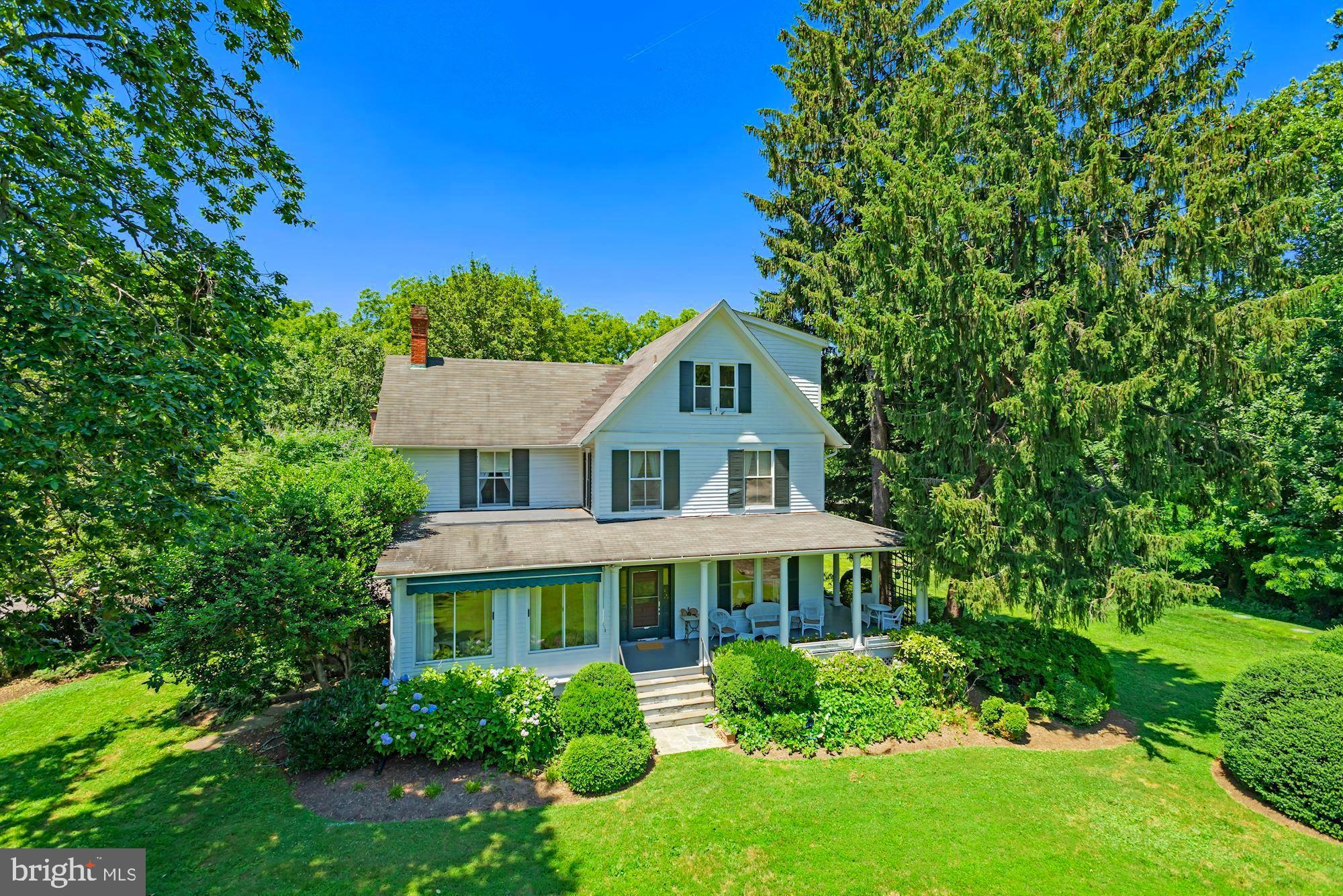 Do NOT call owner, planning to relaunch in the Fall,
Elmwood represents a unique opportunity to own a rambling estate and historic residence inside the Capital Beltway. 
The property includes a grand farmhouse, built in 1905, with an attached wing constructed in 1879. Together they form a seven-bedroom home, tied together with generous wrap-around porches and patios for entertaining. A four-room log cabin and other outbuildings are situated in their original historic locations near the main house. Two additional lots, each 1 acre, have been added to the original property bringing the total acreage to 8.02.  Bedroom on main level with wheel-in shower
A mile from McLean’s central business district, the residence is set back from Old Dominion Drive, accessed by a curving 700+ foot private driveway. The grounds feature significant mature hardwoods, pines, azaleas, and a formally landscaped entrance courtyard with fountain.
Distinguished television journalist Roger Mudd and his wife acquired the property in 1972 and through significant restoration, made Elmwood their family home for almost fifty years.
Originally part of the Fairfax Land grant, “Elmwood” has been a working farm and family estate since the early 18th century. The original house was built in 1850 by Spencer Mottrom Ball but was destroyed during the Civil War. After the War, Ball’s son William Selwyn (“Selly”) returned to Elmwood, building the log “Bachelor’s Hall” in 1876 and a larger house in 1879.
In 1900, John McLean, owner of the Washington Post, was granted a charter to build The Washington and Old Dominion railroad from Rosslyn to Great Falls. McLean bought rights of way along what would eventually become Old Dominion Drive, and the Ball family Family sold access through Elmwood; the stop there was then called “Ball’s Hill." The surrounding public roads - including Ball’s Hill Road, Mottrom Drive and others - capture some of the property’s history.