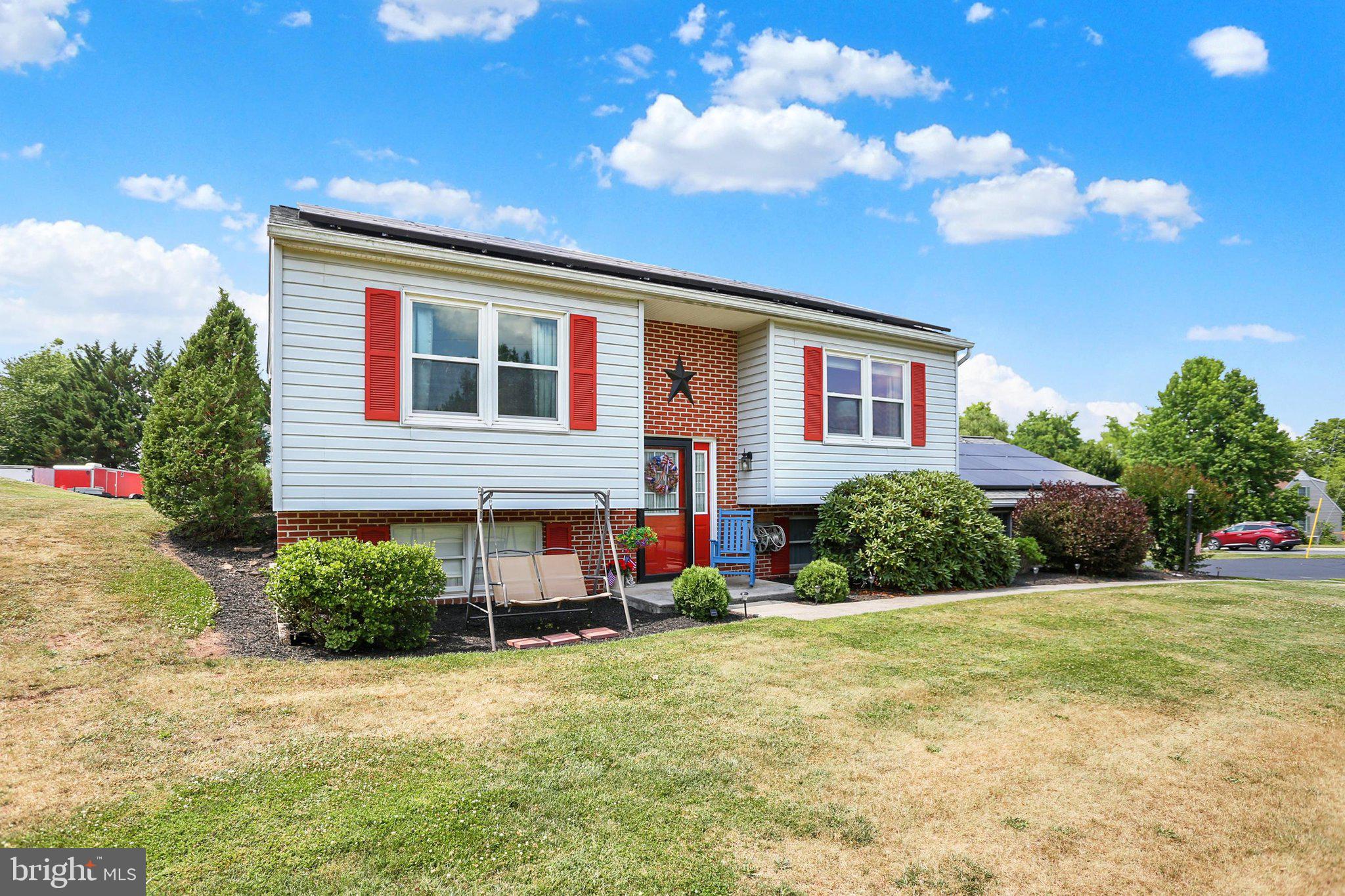 Welcome home to this meticulously cared-for residence, offering the perfect blend of peaceful country living and convenient access to Route 83 for an effortless commute to York or Harrisburg. This property has been thoughtfully updated, featuring a new roof (2025), a new heat pump (2026), a water heater (2022), well pump (2023), and so much more. The kitchen features vaulted ceilings, updated granite countertops and a stylish subway tile backsplash. Energy efficiency is a standout feature, thanks to solar panels that produce credits to reduce electric costs. Step outside to enjoy the serene backyard from the comfort of the deck, which includes an awning for added shade. The home is designed for versatile living, boasting a spacious mudroom and laundry area, and a flexible lower level that can serve as a primary suite with a walk-in closet and full bath, or as a secondary family room. Additionally, the lower level offers a dedicated space perfect for an in-home office or guest room, complemented by ample storage capacity above and behind the garage. With its extensive list of upgrades and functional layout, this home is truly move-in ready.