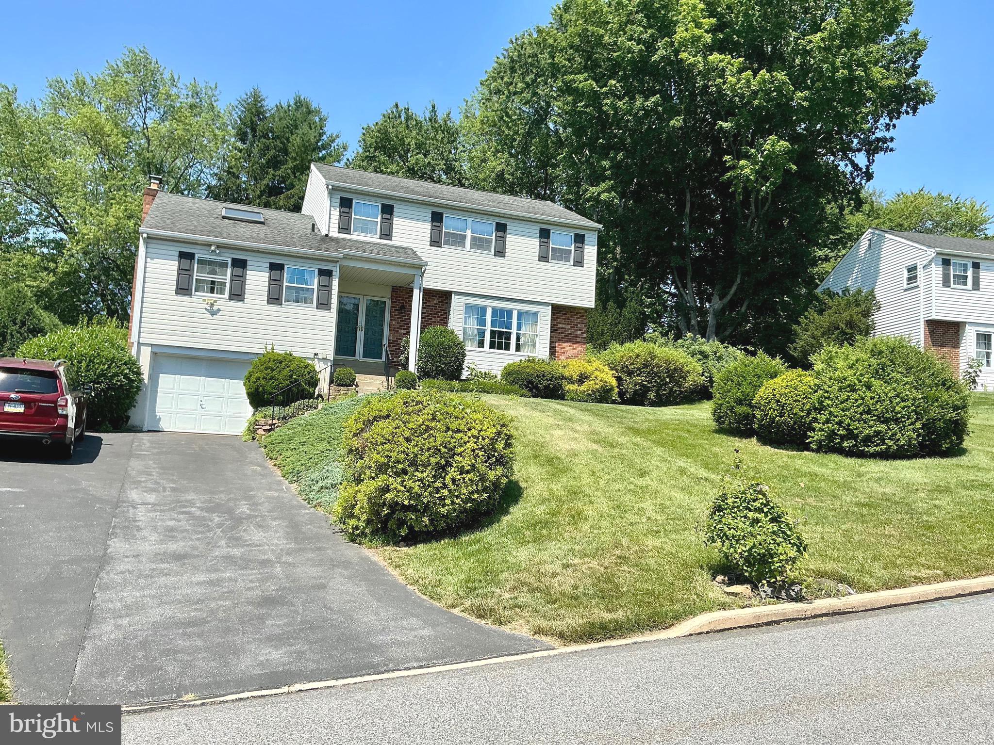 Wonderful 4 bedroom 2.5 bath colonial in great neighborhood.  Beautiful landscaped and fenced in backyard with lots of privacy.  Nice sized (27 x 17) deck.  Nice sized garden shed.  1st floor features  an updated  eat in kitchen with granite countertops     The kitchen  , family room w/ skylight  , laundry and powder room all have beautiful random with hardwood flooring.   There is also a formal dining room and living room. 
The second  floor features 2 full bathrooms and four bedrooms.  The lower level  could be finished since it has a walkout thru the garage.