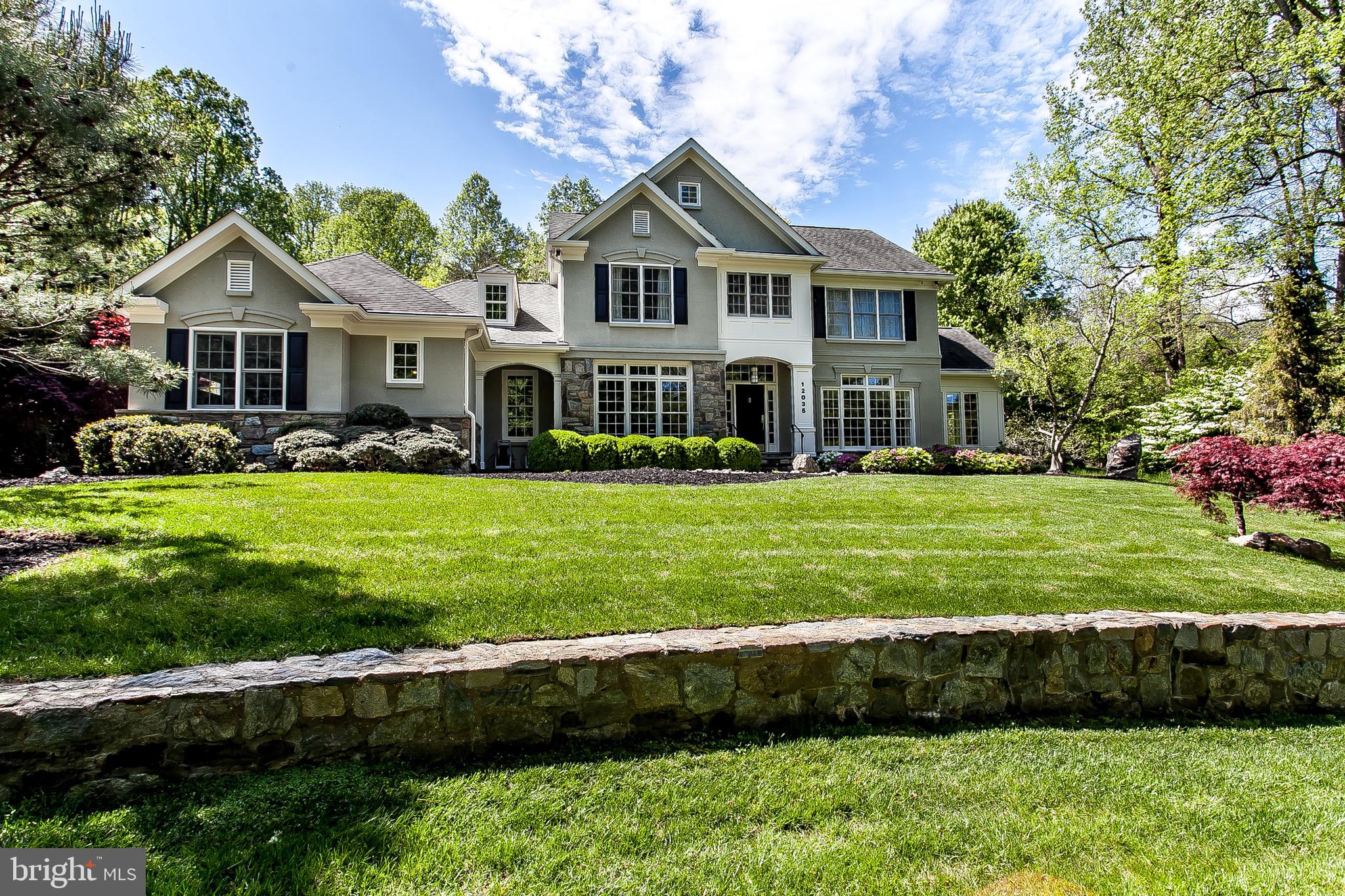 In the heart of Potomac, stands out this beautiful 2+ACRES Mitchell & Best home with unique landscaping and curb appeal!  PRIVATE cul-de-sac, 4+BD/4.5 BA. RENOVATED AND UPDATED THROUGHOUT, this special offering features contemporary interiors and harmonious, sophisticated design.  Grand two-story foyer with a magnificent, designer chandelier.  Formal dining room and living room; sun-filled office/den. Large, open gourmet kitchen with high end appliances leads to the fabulous great room boasting a modern, travertine stone fireplace.  Large windows that overlook the spectacular backyard; Ample 3-car garage.  A large master suite dominates the second level.  Modern master bathroom accented with imported European cabinetry and a pebble-and-stone shower.  3 additional bedrooms and 2,  JUST REMODELED designer bathrooms!  Spacious lower level with just installed, premium carpeting; home theater/surround sound system & wet bar.  Au Pair/Guest area and 4th full bathroom; cardio room and cedar closet.  Enjoy peace of mind w/newer HVACs and house generator.  Low-maintenance front/backyard, professionally landscaped by ZEN ASSOCIATES.  Oversized Trex deck, fieldstone patio, four stone walls, custom water fountains embedded in river rocks; underground sprinkler system & distinctively designed ground lighting.  An invitation to tranquil hours of outdoor relaxation in this impeccably maintained property.