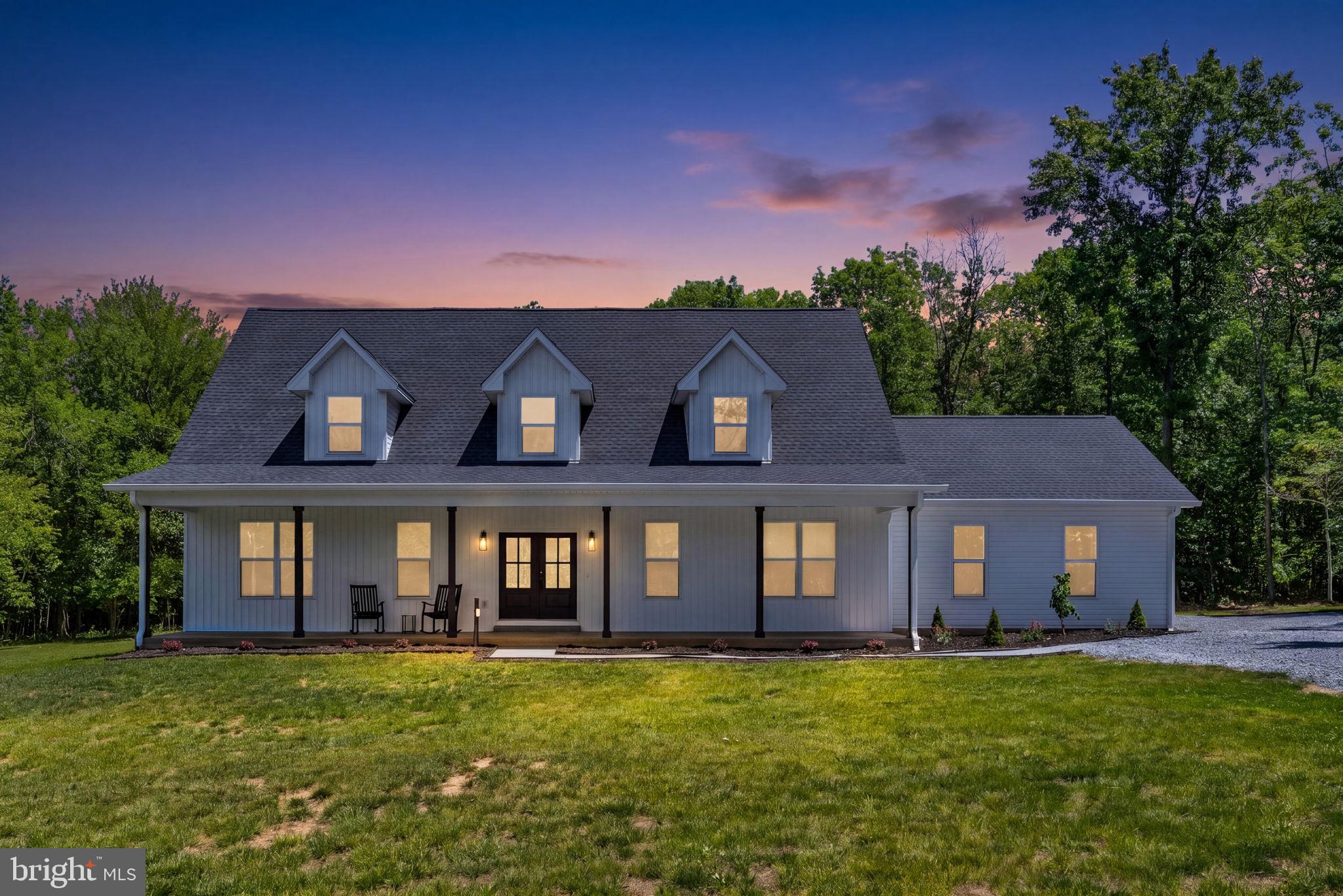 Modern farmhouse elegance meets peaceful country living on this stunning private 10-acre retreat. Built in 2024 this beautifully crafted Craftsman-style home offers the perfect blend of luxury, functionality, and modern farmhouse charm. Featuring 3 spacious bedrooms, 3.5 bathrooms, and thoughtfully designed main-level living, this property provides both comfort and flexibility for today’s lifestyle.

Inside, you’ll find an open-concept floor plan filled with natural light and upscale finishes throughout. The gourmet kitchen is a true centerpiece, showcasing a large entertaining island, custom-made range hood, coffee bar, and stylish modern farmhouse details ideal for both everyday living and hosting guests. The expansive primary suite and main living areas are conveniently located on the main level for effortless living.

Upstairs offers additional flexible living space with two oversized offices that could easily serve as potential bedrooms, guest rooms, hobby spaces, or private work-from-home retreats. Ample garage space and additional parking provide room for vehicles, equipment, or recreational storage.

Surrounded by the beauty and privacy of 10 scenic acres, this exceptional property delivers the tranquility of country living while still offering the sophistication and modern conveniences buyers desire. A rare opportunity to own a nearly new custom farmhouse with space, privacy, and versatility.