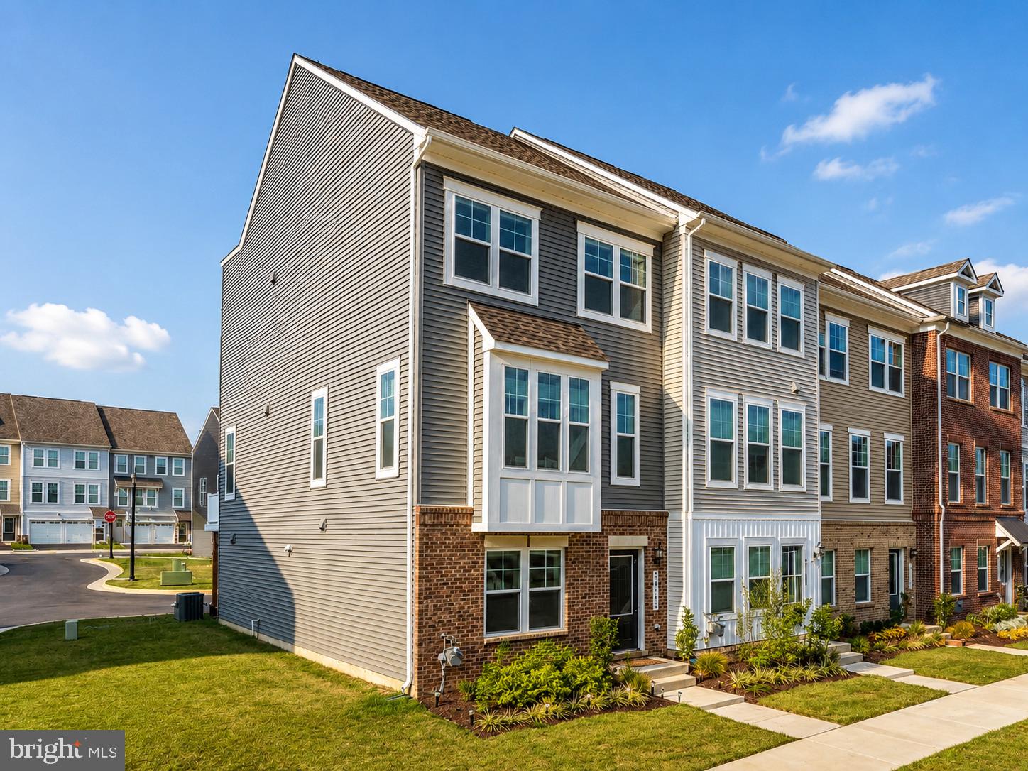 Welcome to Arcola Town Center, one of Northern Virginia’s most sought-after communities. This East-facing, end-unit Stanley Martin Jenkins model was built in 2024 and features a rooftop terrace, over $50,000 in upgrades, and multiple builder bump-outs.


The home offers nearly 2,500 square feet across four finished levels, designed with modern farmhouse style and comfortable living in mind. It includes 4 bedrooms, 3.5 bathrooms, and a 2-car garage.


The entry level provides a flexible bedroom that can be used as a guest suite, office, or fitness space, along with a full bath and garage access with additional storage.


The main level features an open floor plan with a chef’s kitchen, stainless steel appliances, upgraded white cabinetry, quartz island, and bright living and dining areas with large windows and luxury vinyl plank flooring. This level also opens to a spacious Trex deck.


The upper level includes three bedrooms, highlighted by a primary suite with custom shelving, a walk-in closet, and a spa-style bathroom with a soaking tub and dual vanity.


The top level includes a private enclosed room and access to the rooftop terrace, offering flexible space for work, guests, or entertaining.


Additional upgrades include recessed and pendant lighting, premium blinds, and an epoxy-finished garage. The HOA provides landscaping and exterior maintenance for easy living.


Conveniently located near Route 50, Route 606, the Dulles Toll Road, Silver Line Metro, shopping, dining, and Dulles International Airport, with access to walking trails, a pool, clubhouse, playgrounds, and tot lots. Zoned for desirable Loudoun County schools and close to everyday conveniences.


This home combines style, location, and modern comfort in a growing and well-connected community.