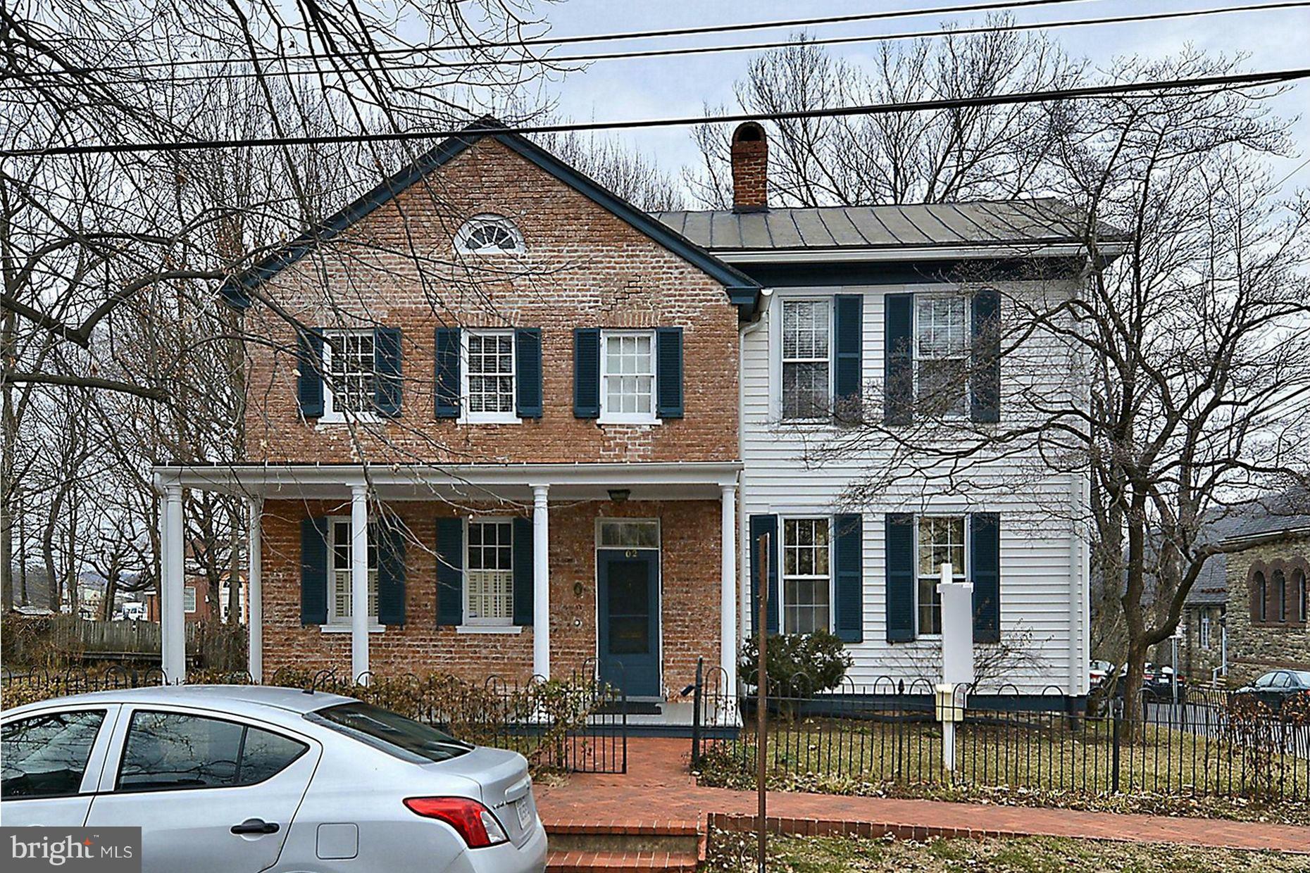 Wonderful historic home within 2 blocks of the center of Leesburg. Updated baths, kitchen, newer HVAC system. Hardwood floors throughout. Huge family room. Unique canopy ceiling in dining room. Detached two car garage with lots of storage and two room aptmnt on second floor. Property situated on half a city block with frontage on three streets and could be subdivided into 4 lots