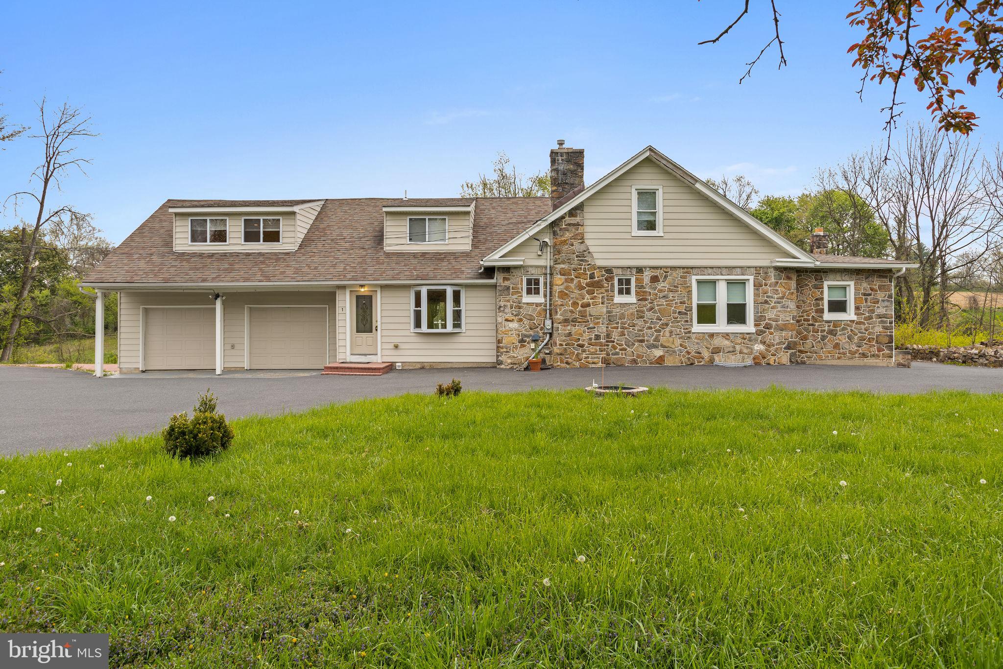 Welcome to this stunningly remodeled Cape Cod home on a spacious seven-acre lot in Lower Saucon Township, Northampton County. This charming home boasts a modern, yet cozy interior featuring an open-concept living room with a fireplace, a gourmet kitchen with stainless steel appliances, granite countertops, and an island for casual dining, a formal dining room, and a comfortable family room. The home has four well-appointed bedrooms, including a master suite with a walk-in closet! The two-car attached garage offers plenty of storage space and easy access to the home. Outside, the property offers many acres of scenic beauty, including a large yard, mature trees, and a serene stream running through the land. Located in a peaceful neighborhood, this home offers a perfect blend of privacy and convenience. Don't miss the opportunity to make it your own!