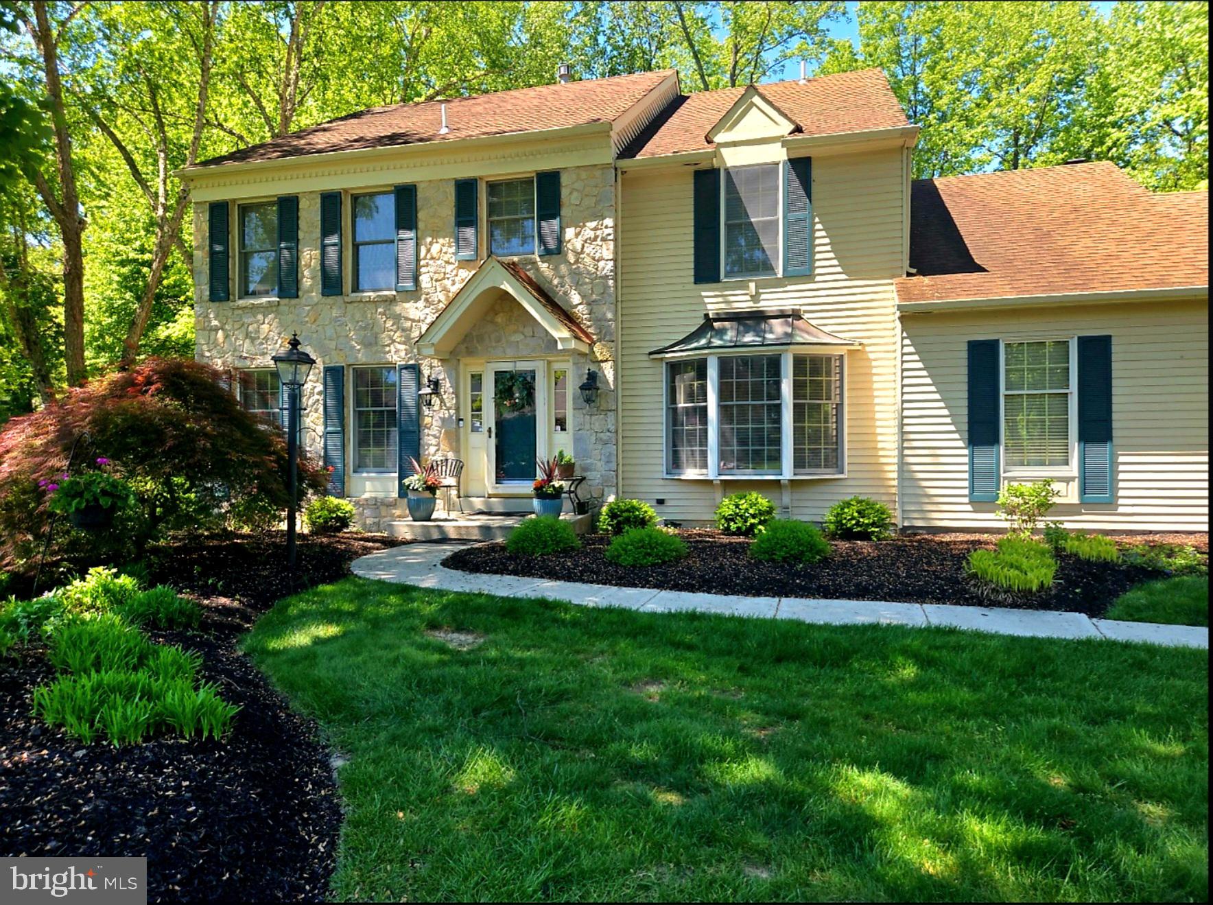 Updated and meticulously maintained stone-front Colonial located in the desirable Yardley Crest neighborhood. This spacious 4-bedroom, 3.5-bath home offers a traditional floor plan with numerous upgrades throughout.
The main level features formal living and dining rooms with refinished hardwood flooring, along with a comfortable den showcasing a wood-burning fireplace, custom mantel, built-in bookshelves, and hardwood floors. A convenient first-floor laundry room includes a brand-new door leading to the rear yard.
The updated kitchen boasts wood cabinetry, granite countertops, a center island, stainless steel appliances, a pantry, and ceramic tile flooring. Adjacent to the kitchen is a bright breakfast room featuring built-in bookshelves, tile flooring, a vaulted ceiling, fireplace and a newer sliding glass door that opens to the fenced backyard.
Upstairs, the primary suite offers hardwood flooring, a sitting area, and a beautifully remodeled en-suite bathroom with ceramic tile floors, a soaking tub, a separate tiled shower, a vanity, and a new medicine cabinet. Three additional bedrooms provide ample closet space and comfortable carpeting.
The finished basement expands the living space with a large recreation/play area featuring a gas fireplace, a spacious walk-in storage room, a separate office or workout room with glass block wall, and a fully remodeled full bathroom.
Ideally located near shopping, dining, highly rated schools, Yardley Borough, major highways, and public transportation, this exceptional home combines comfort, convenience, and timeless appeal.